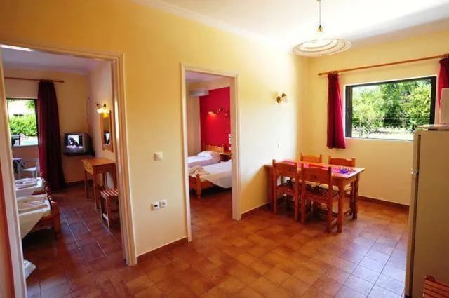 Dining area, Bed in Apartments Corfu Sun Pool Side