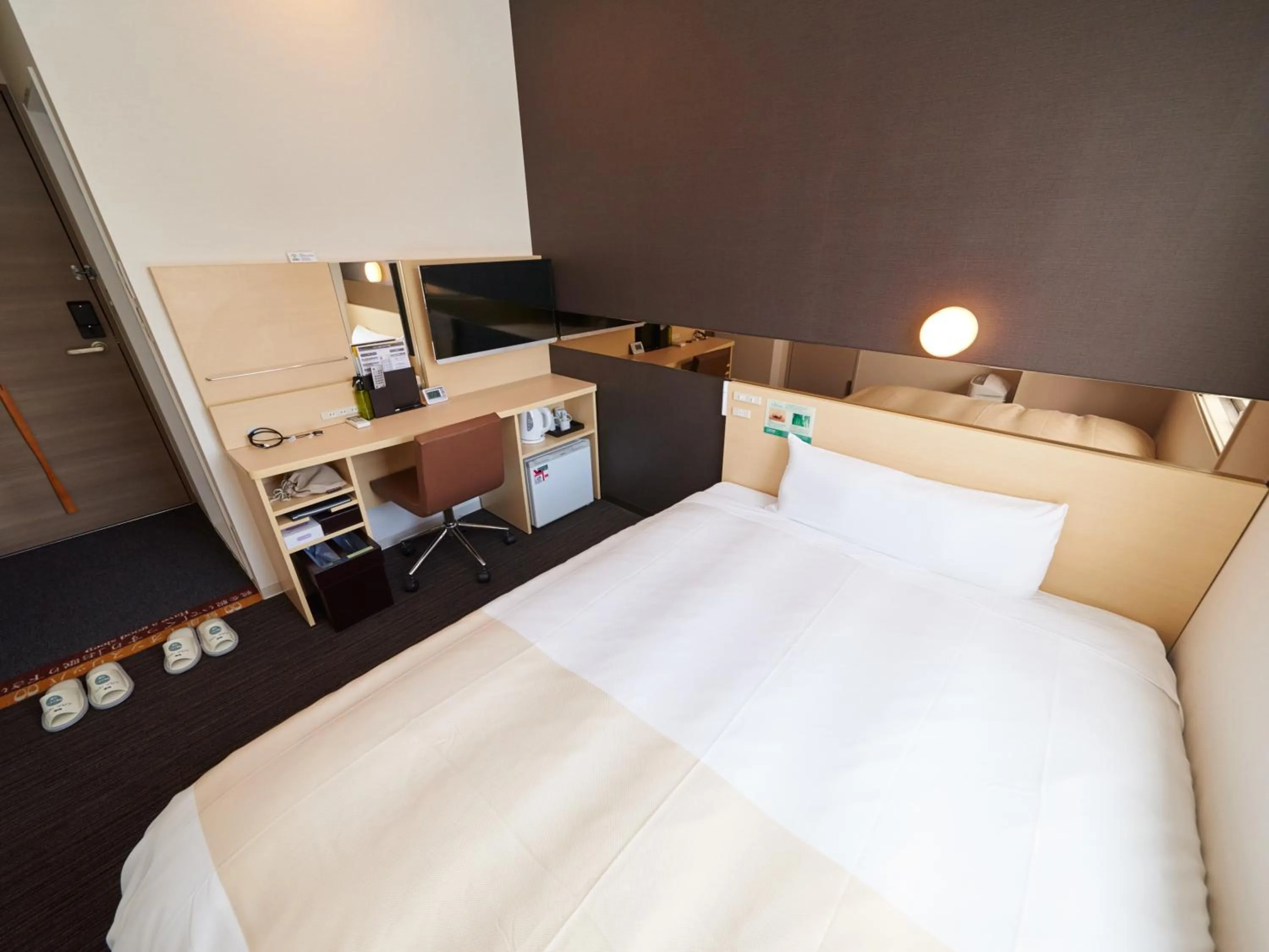 Bed in Super Hotel JR Nara Ekimae Sanjo Dori