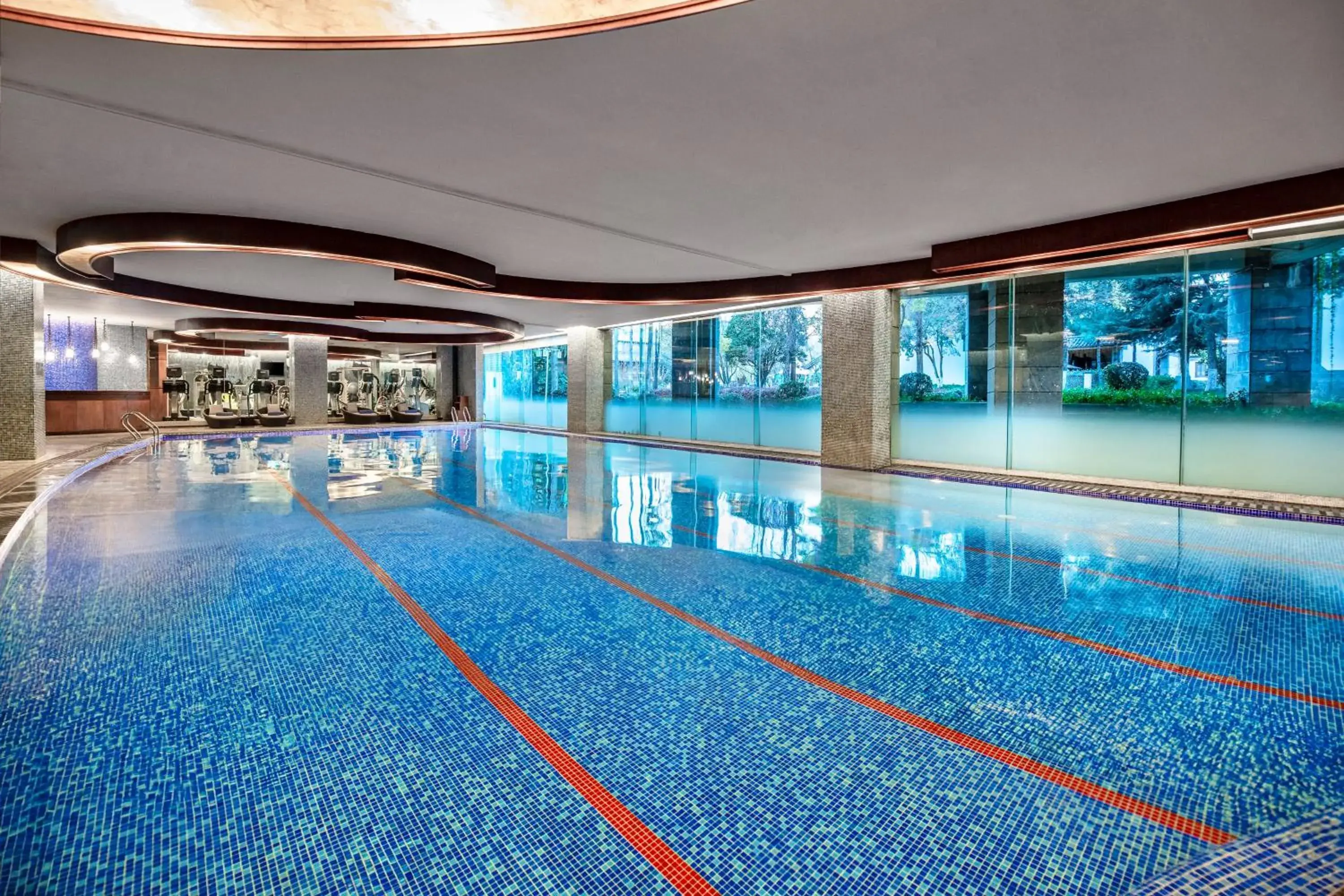 Swimming pool in InterContinental Lijiang Ancient Town Resort by IHG Swimming pool in InterContinental Lijiang Ancient Town Resort by IHG