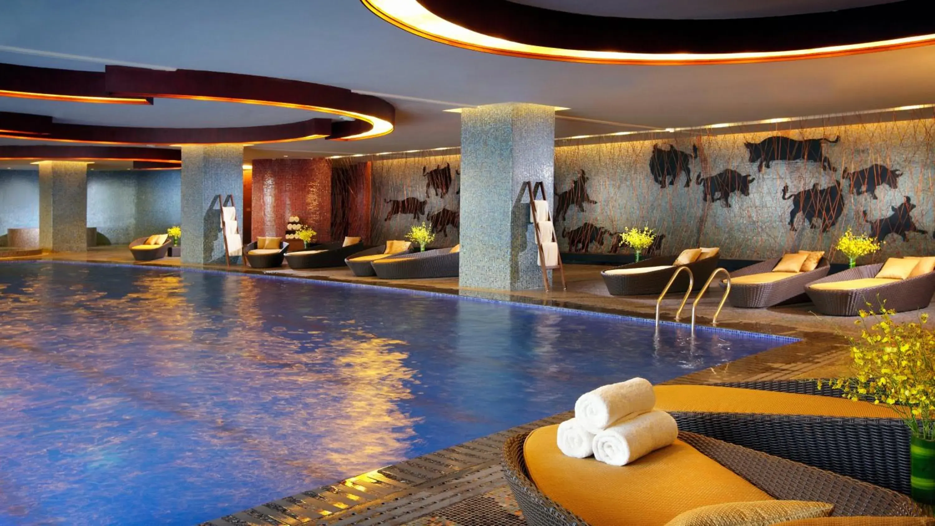 Swimming pool in InterContinental Lijiang Ancient Town Resort by IHG Swimming pool in InterContinental Lijiang Ancient Town Resort by IHG