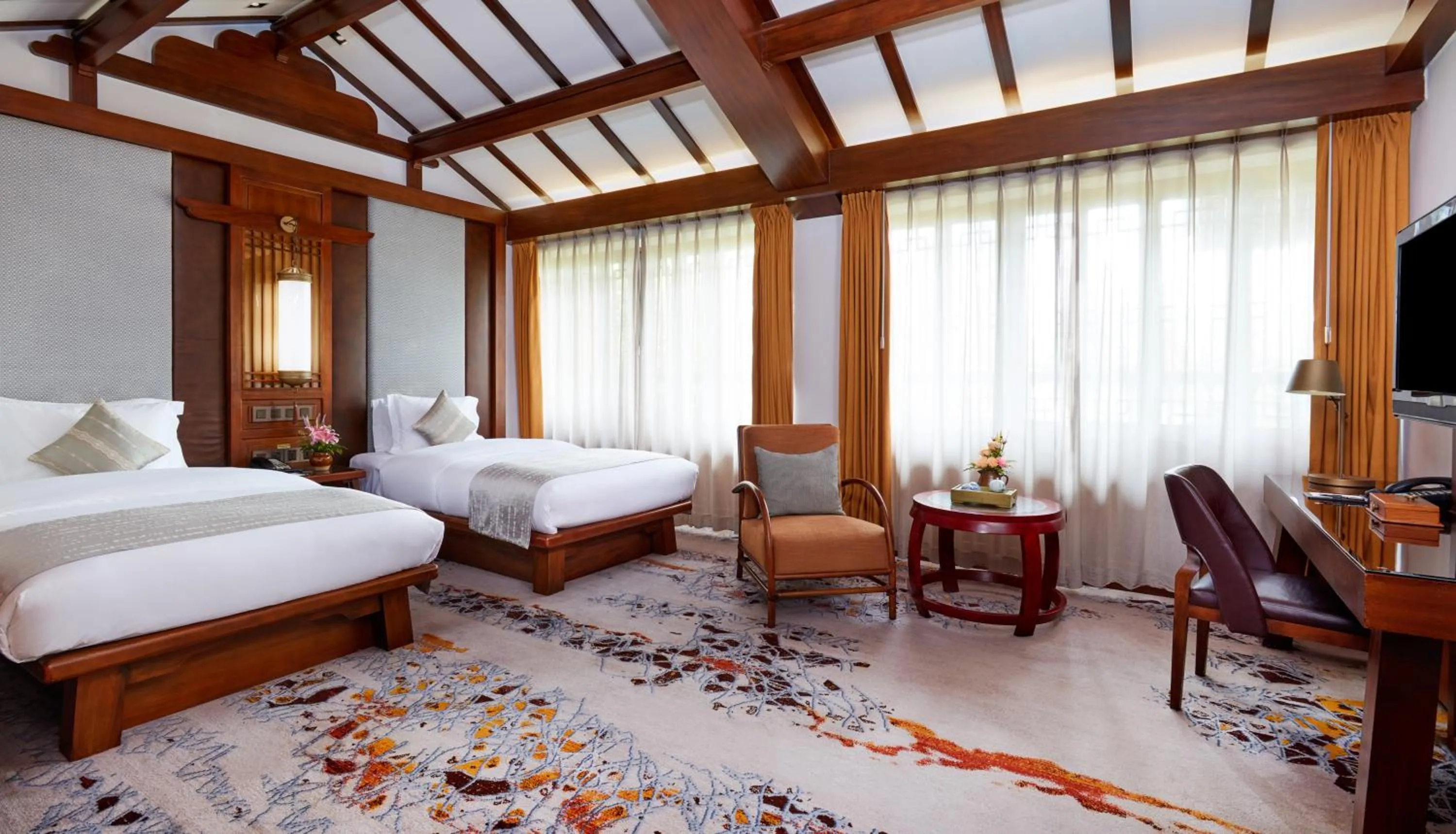 Photo of the whole room, Bed in InterContinental Lijiang Ancient Town Resort by IHG