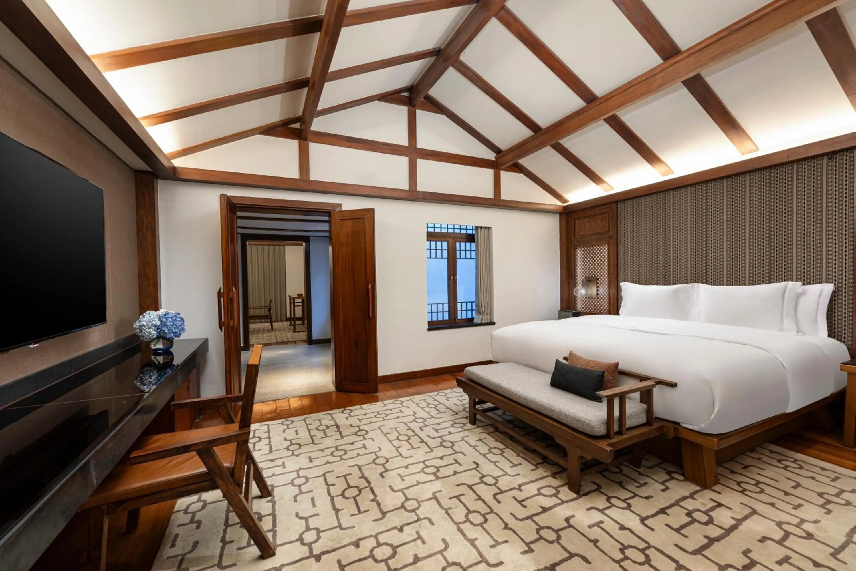 Photo of the whole room, Bed in InterContinental Lijiang Ancient Town Resort by IHG