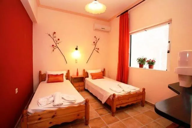 Bed in Apartments Corfu Sun Sea Side