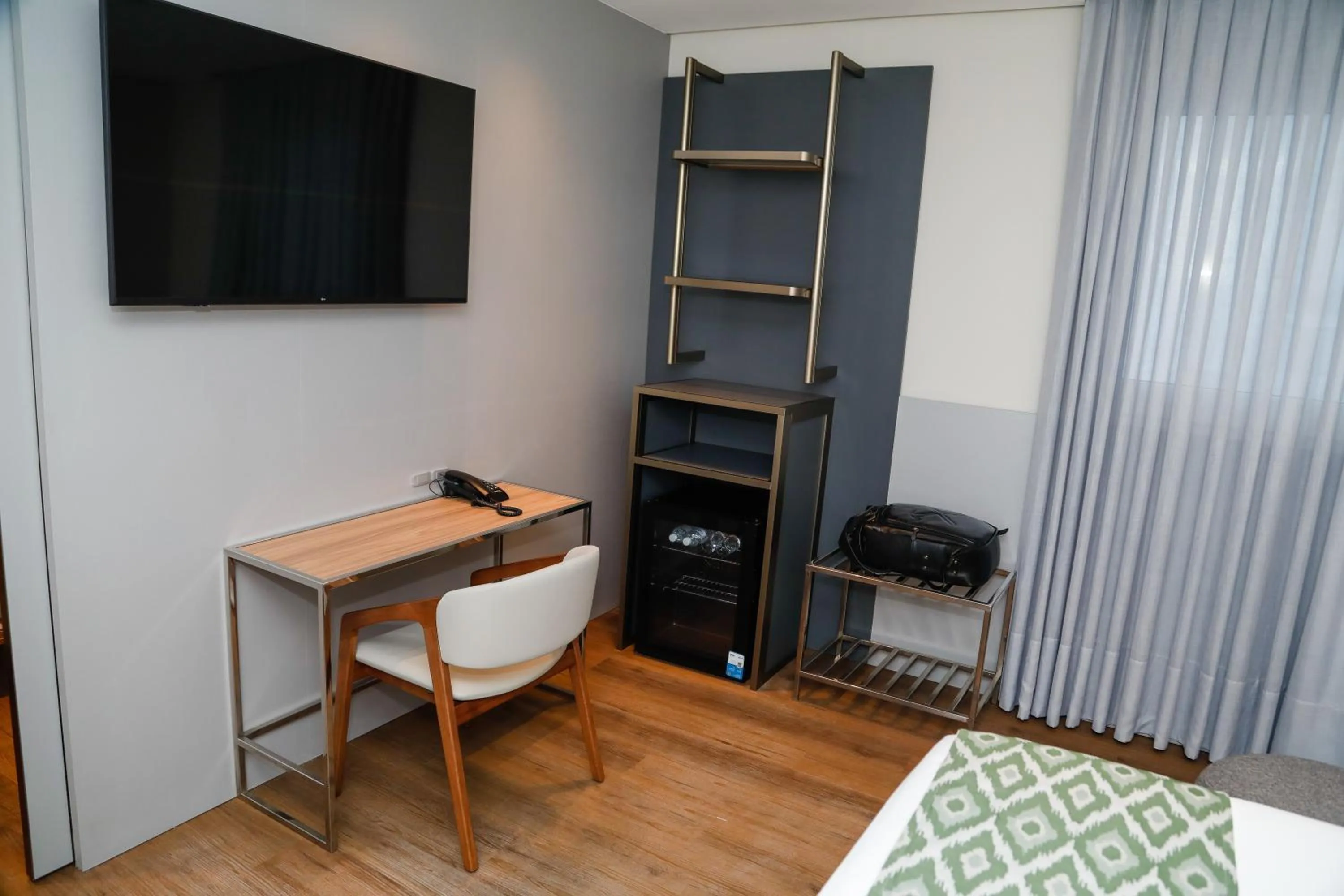 Bedroom in Sandri City Hotel