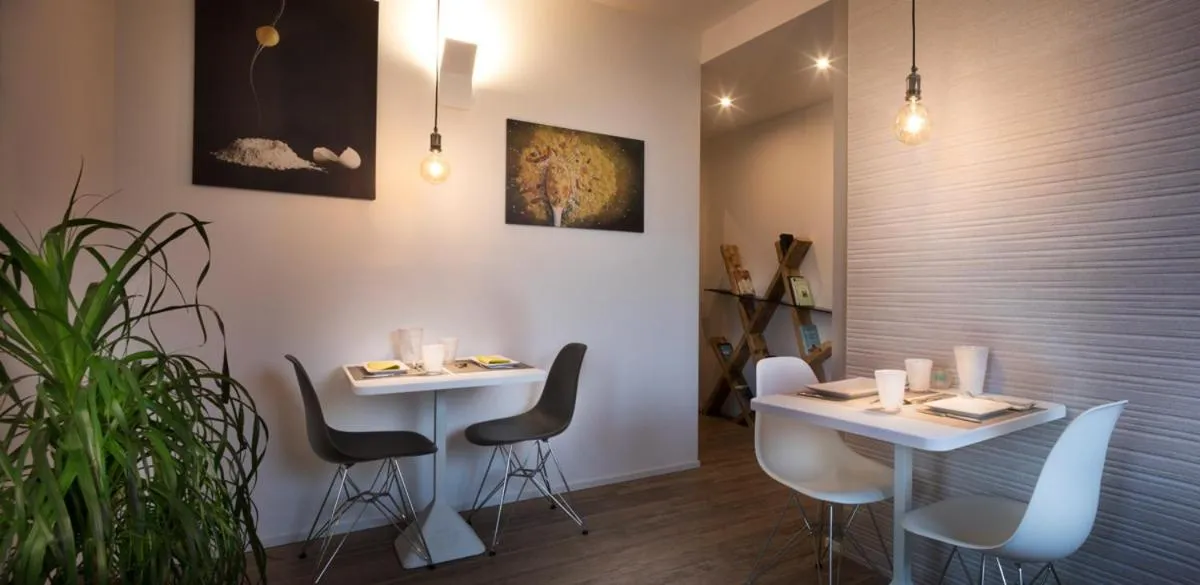 Communal lounge/ TV room in B&B Le Farfalle