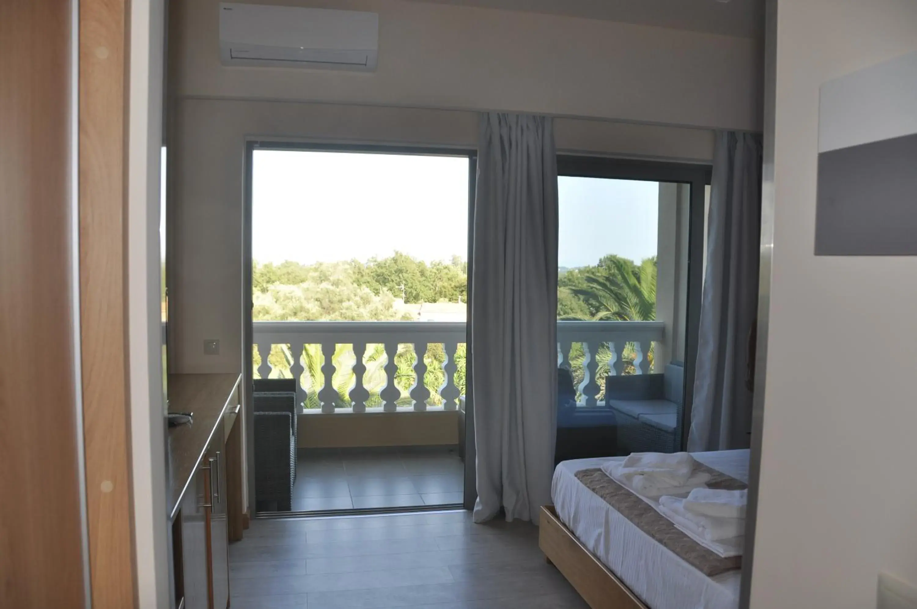 Balcony/Terrace, Bed in Fiori Hotel Balcony/Terrace, Bed in Fiori Hotel