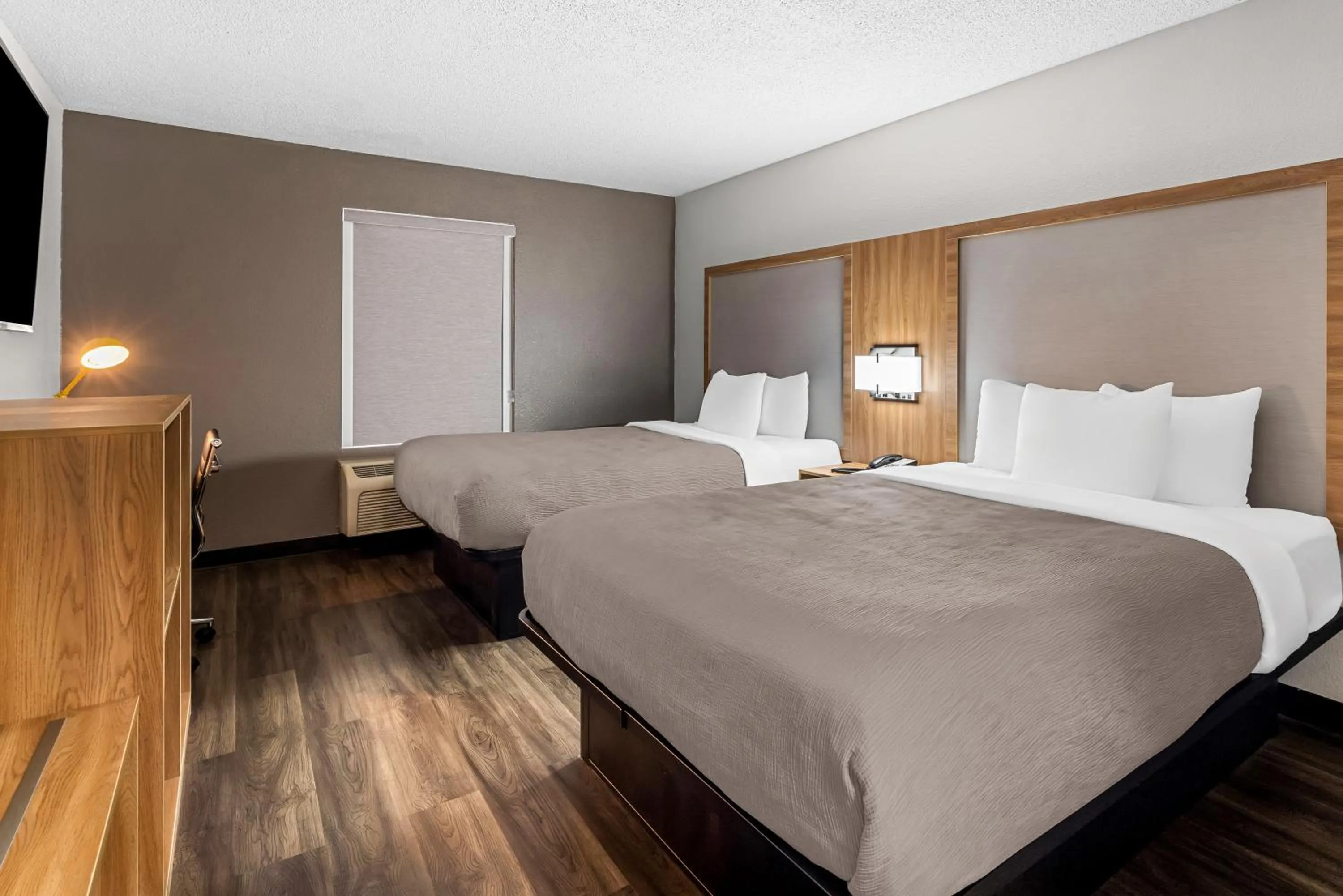 Bed in Quality Inn Cornelia