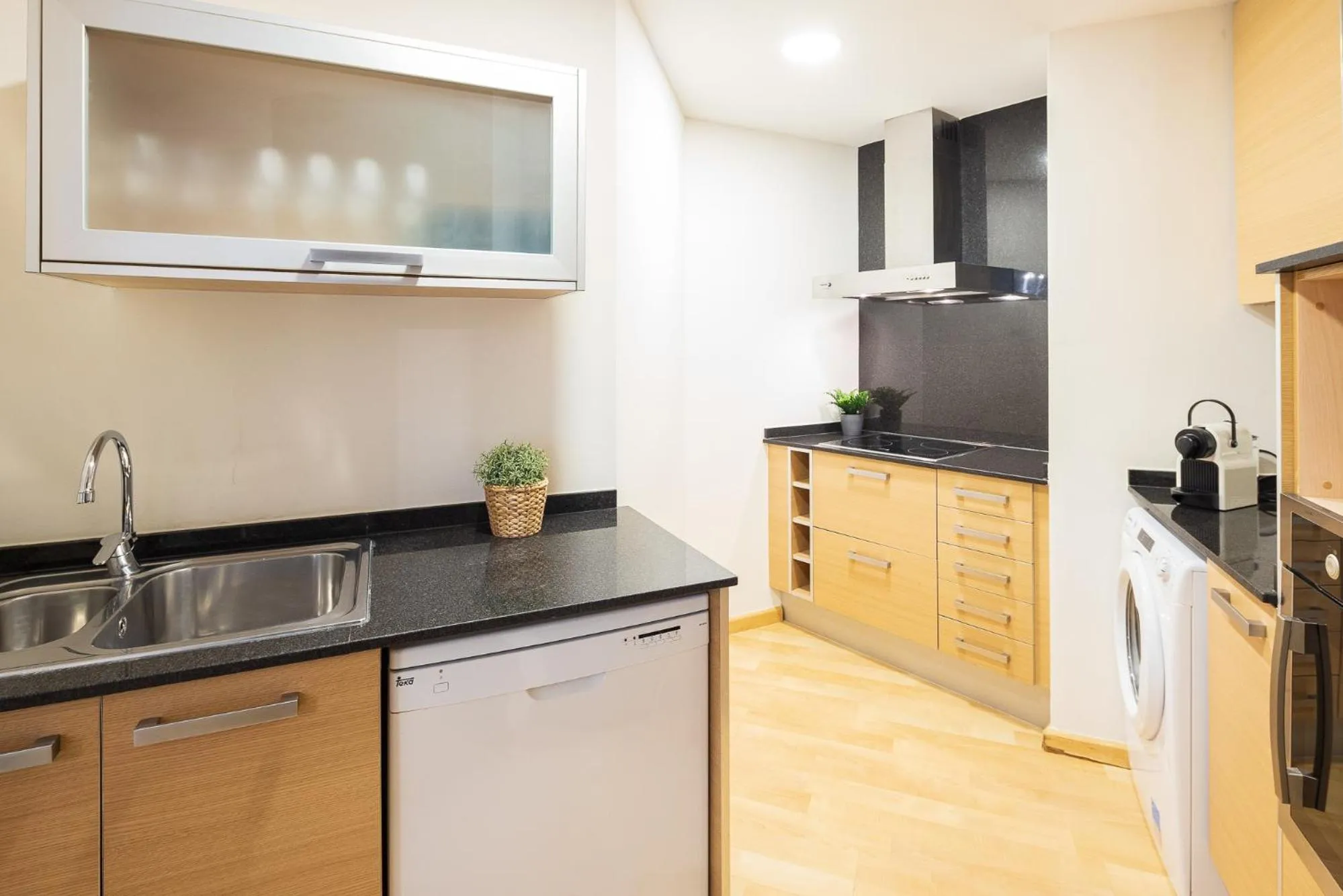 Kitchen or kitchenette in Lucas House Apartments by Sitges Group