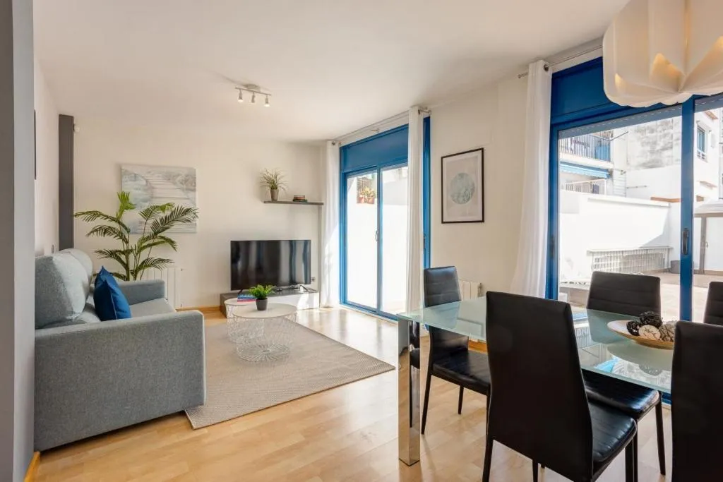 Living room in Lucas House Apartments by Sitges Group