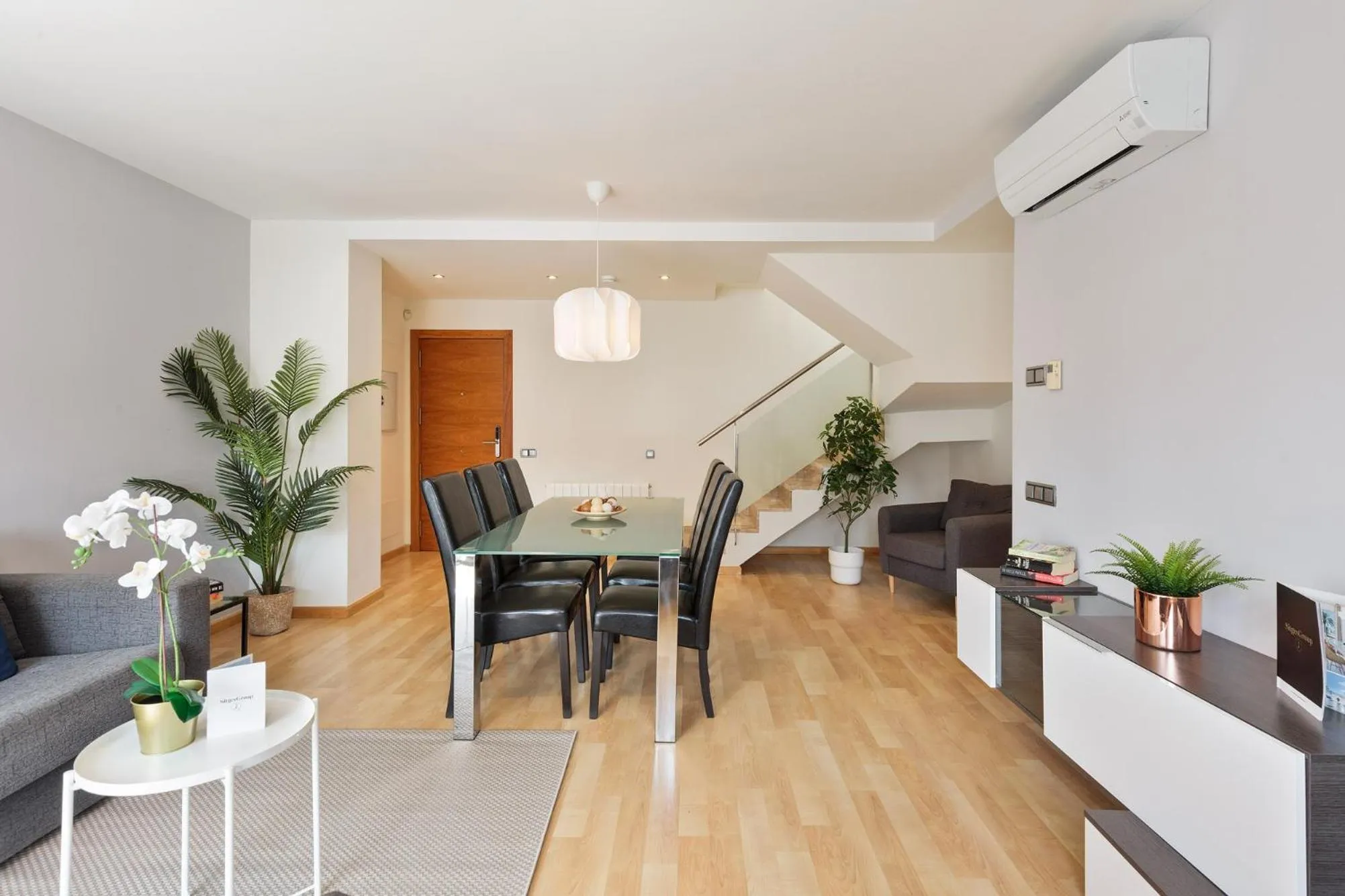Living room in Lucas House Apartments by Sitges Group