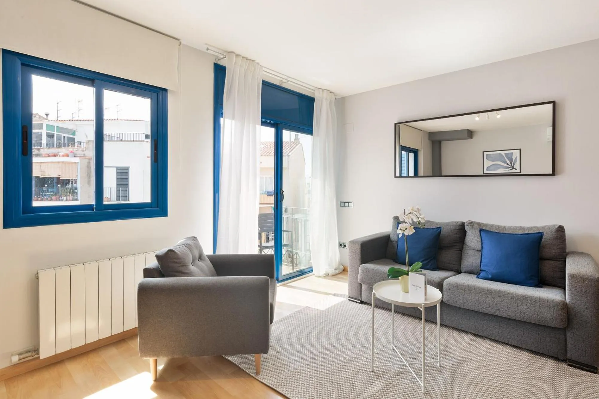 TV and multimedia in Lucas House Apartments by Sitges Group