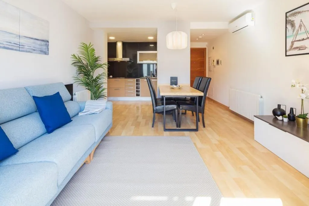 Living room in Lucas House Apartments by Sitges Group