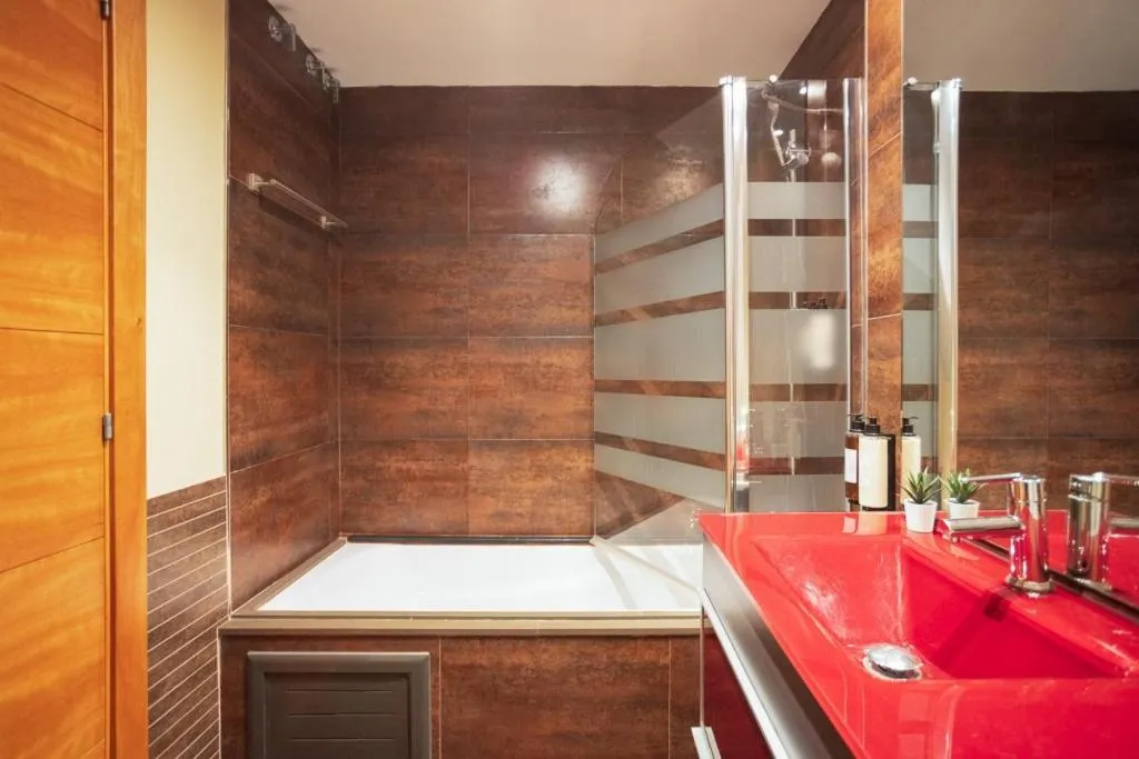 Bathroom in Lucas House Apartments by Sitges Group