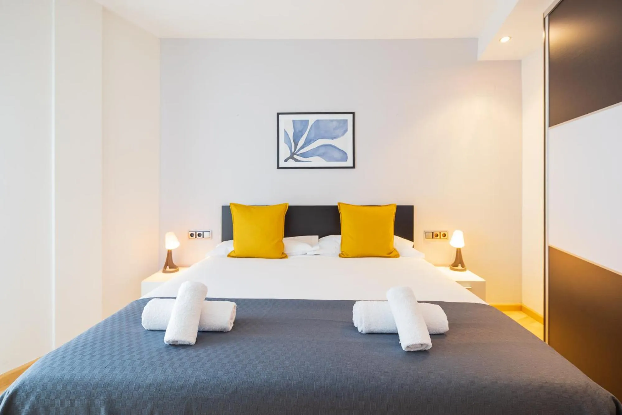 Bed in Lucas House Apartments by Sitges Group