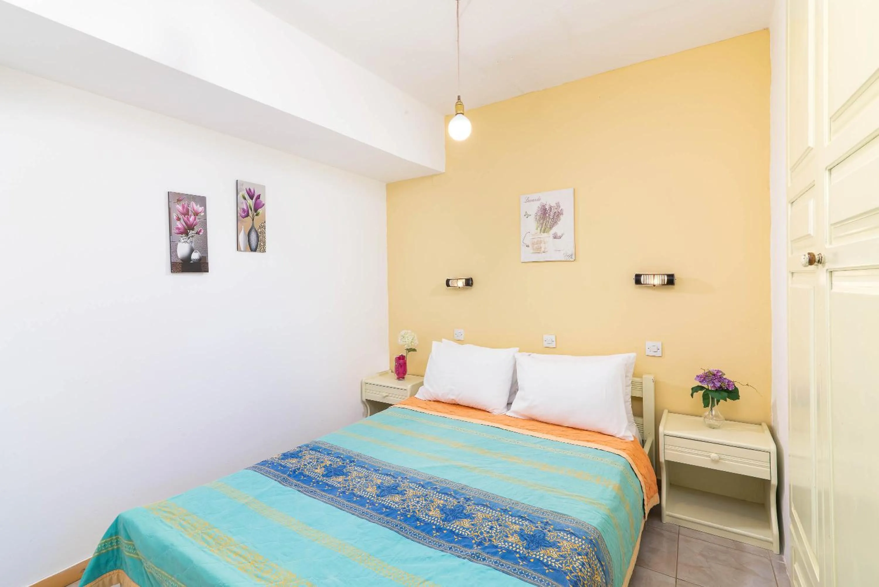 Bed in Afroditi Apartments