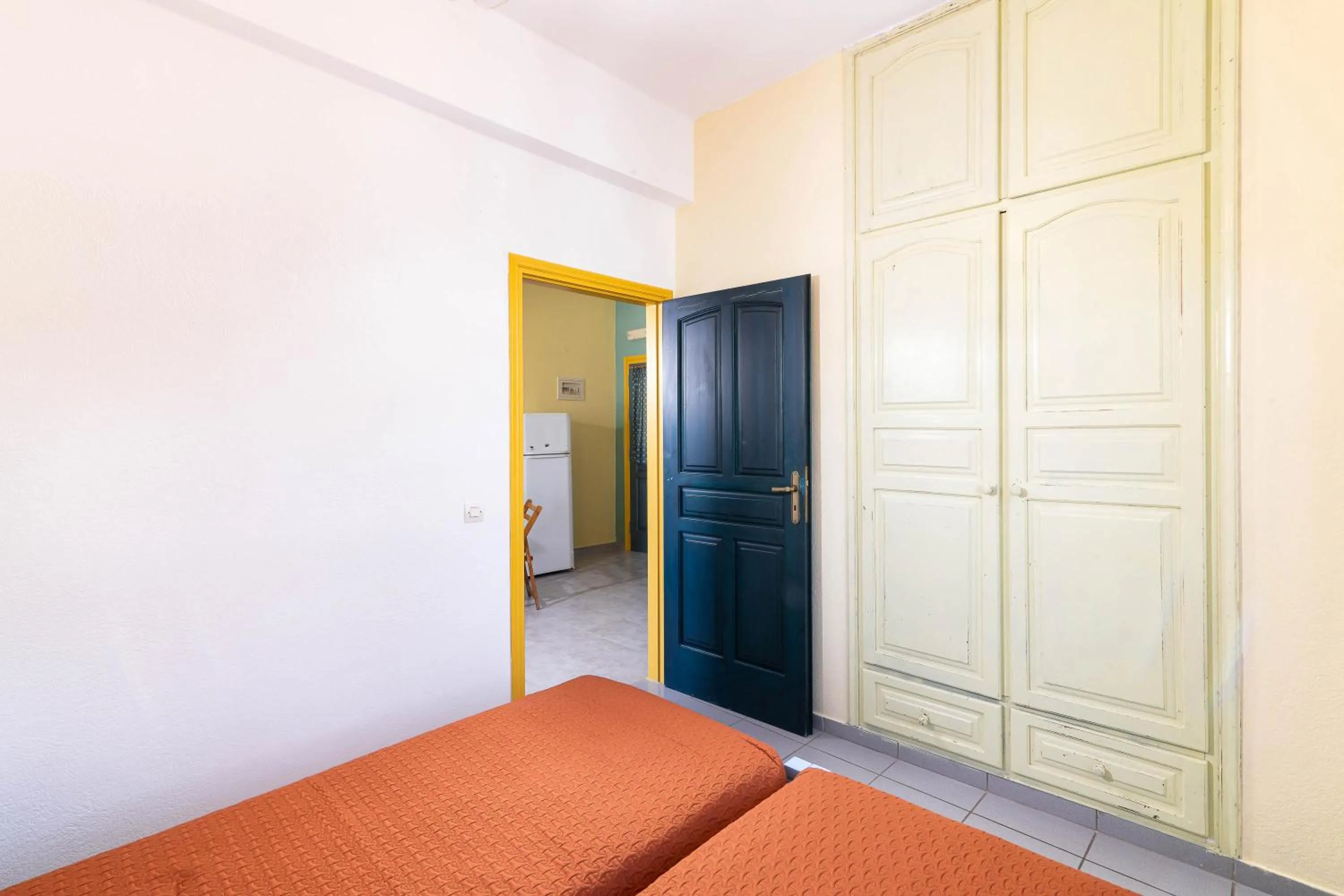 Bed in Afroditi Apartments