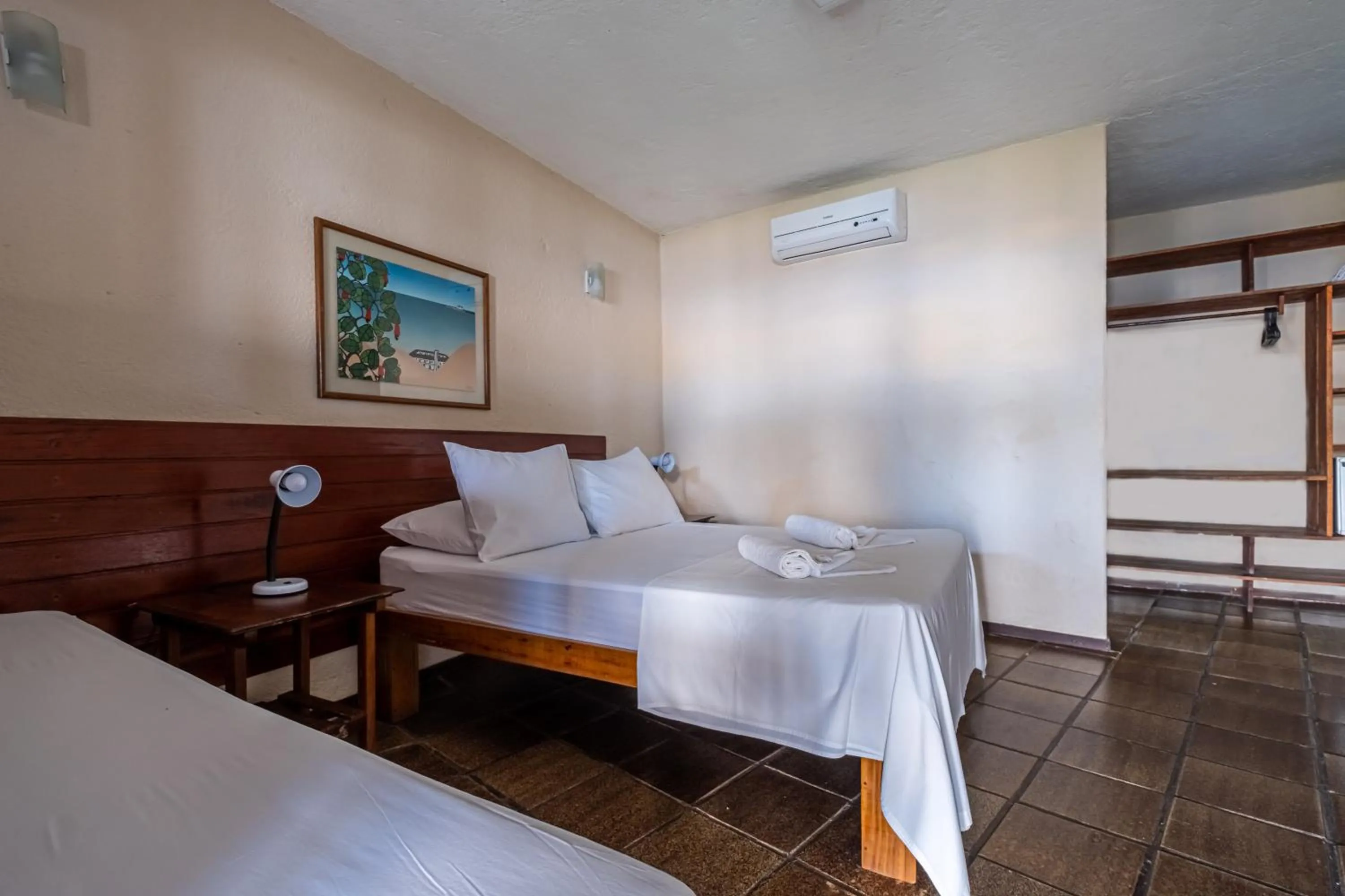 Bed in Pousada Villa do Sol