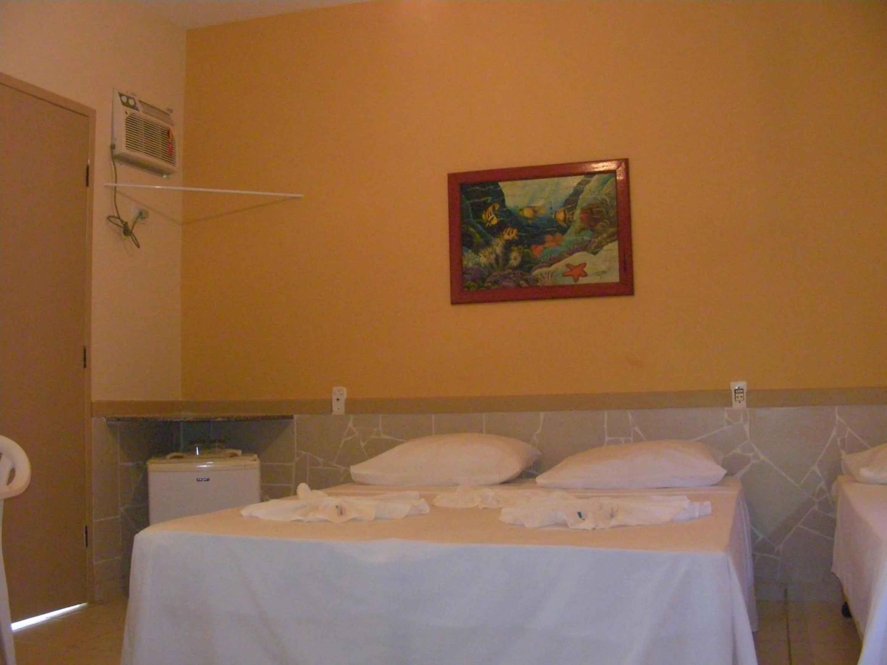 Photo of the whole room, Bed in Duas Praias Hotel Pousada