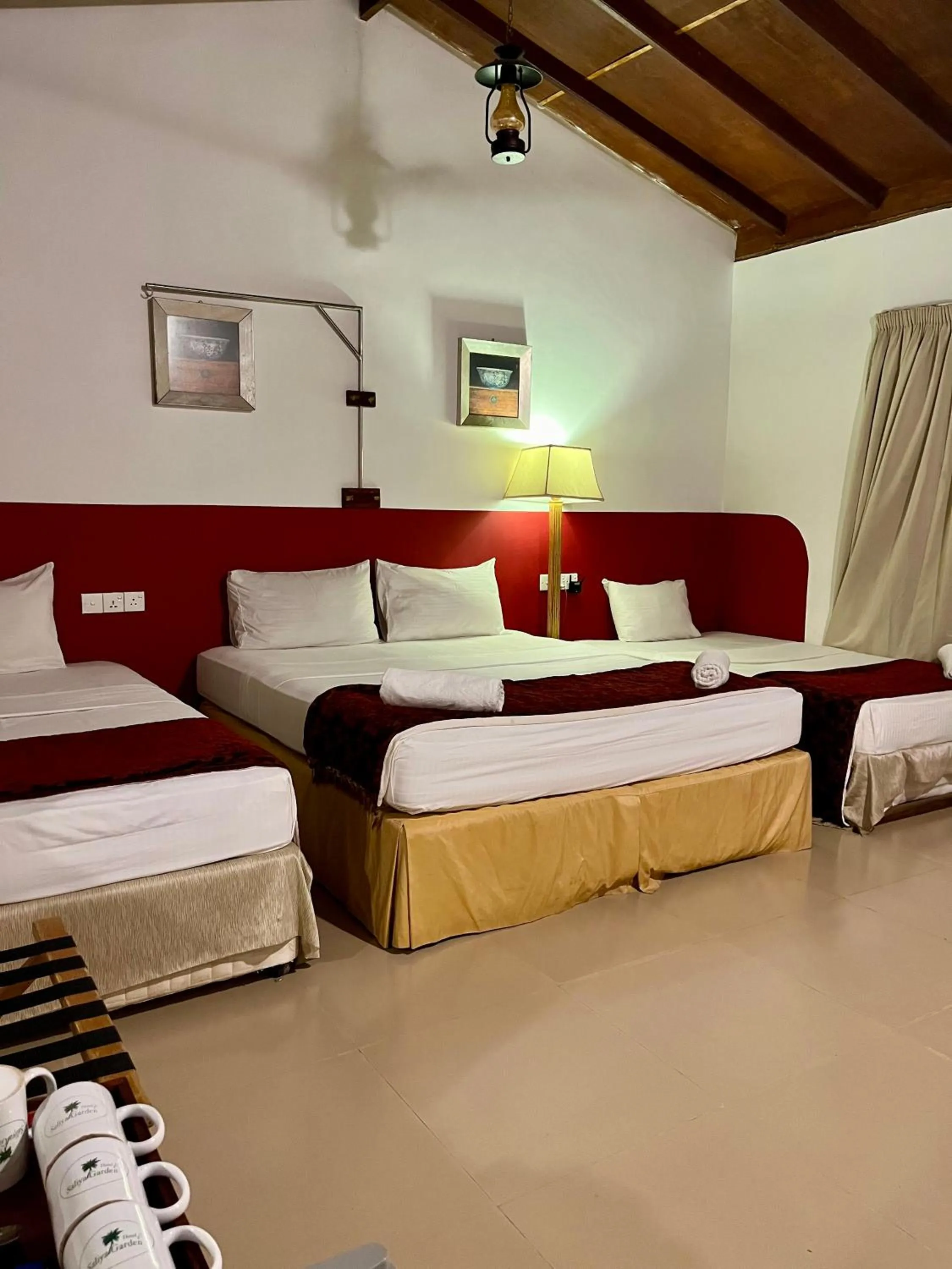 Bed in Hotel 4 U Saliya Garden