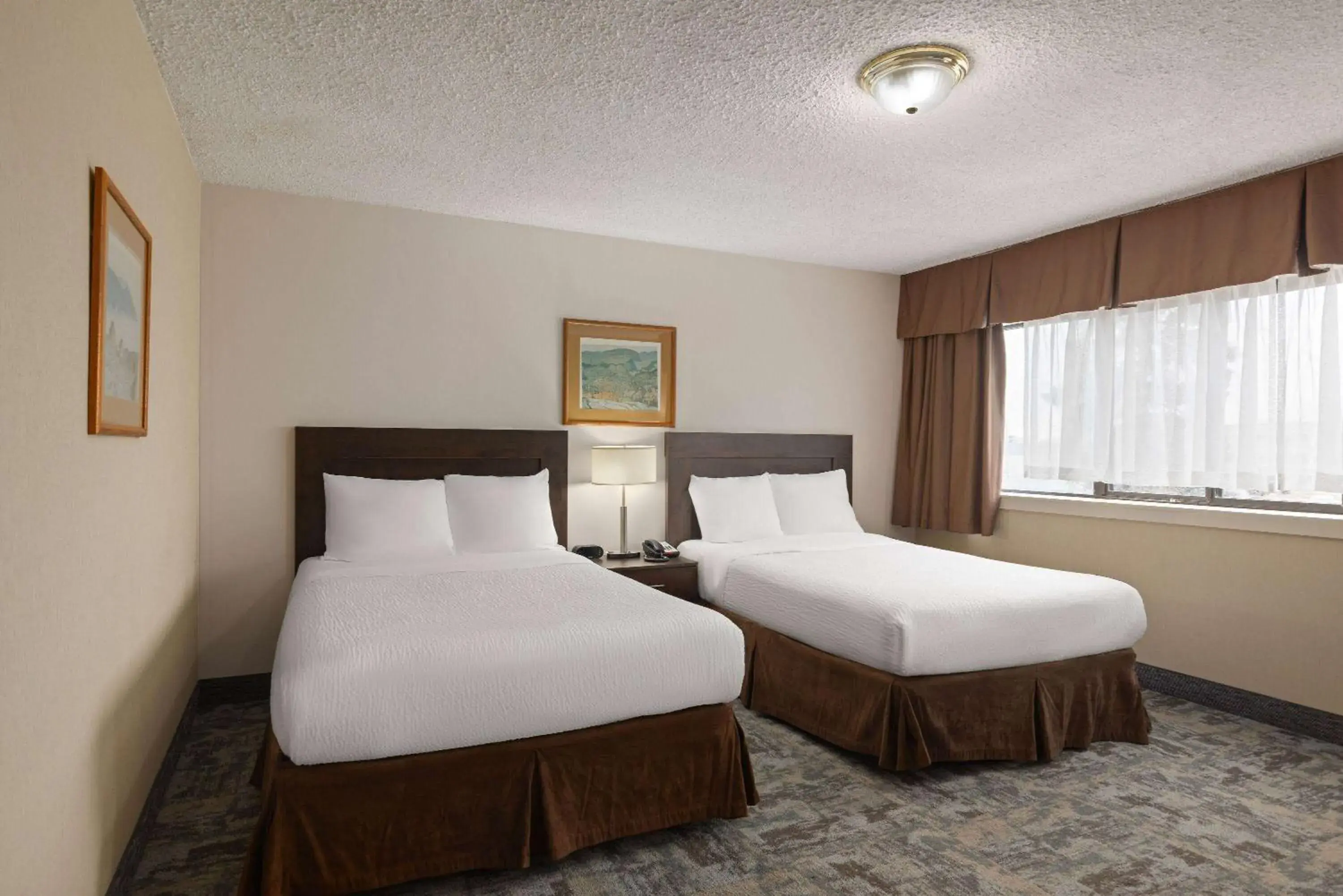 Photo of the whole room, Bed in Travelodge by Wyndham Thunder Bay ON Photo of the whole room, Bed in Travelodge by Wyndham Thunder Bay ON