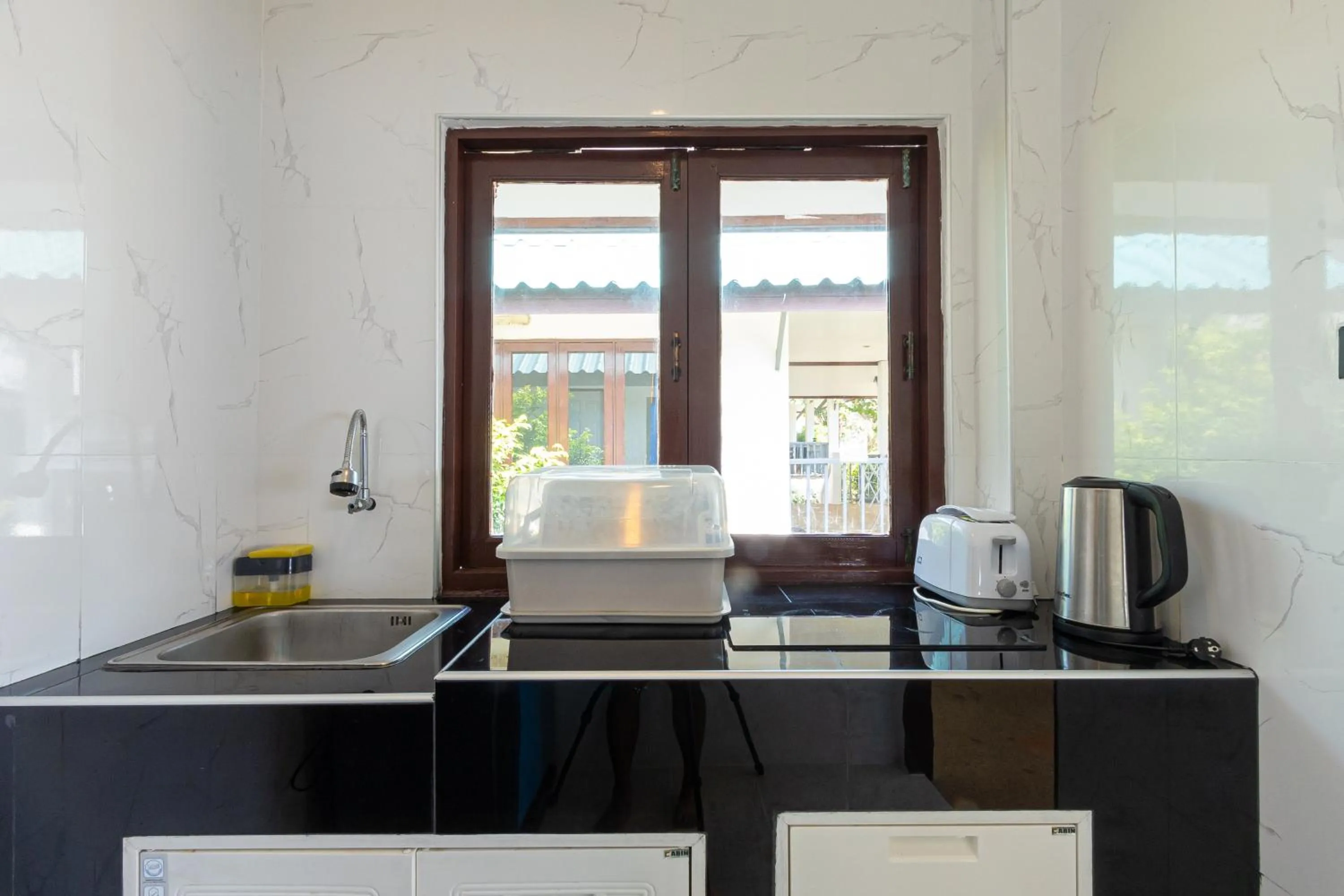 kitchen in Three Trees Samui Resort - Sarocha Villa