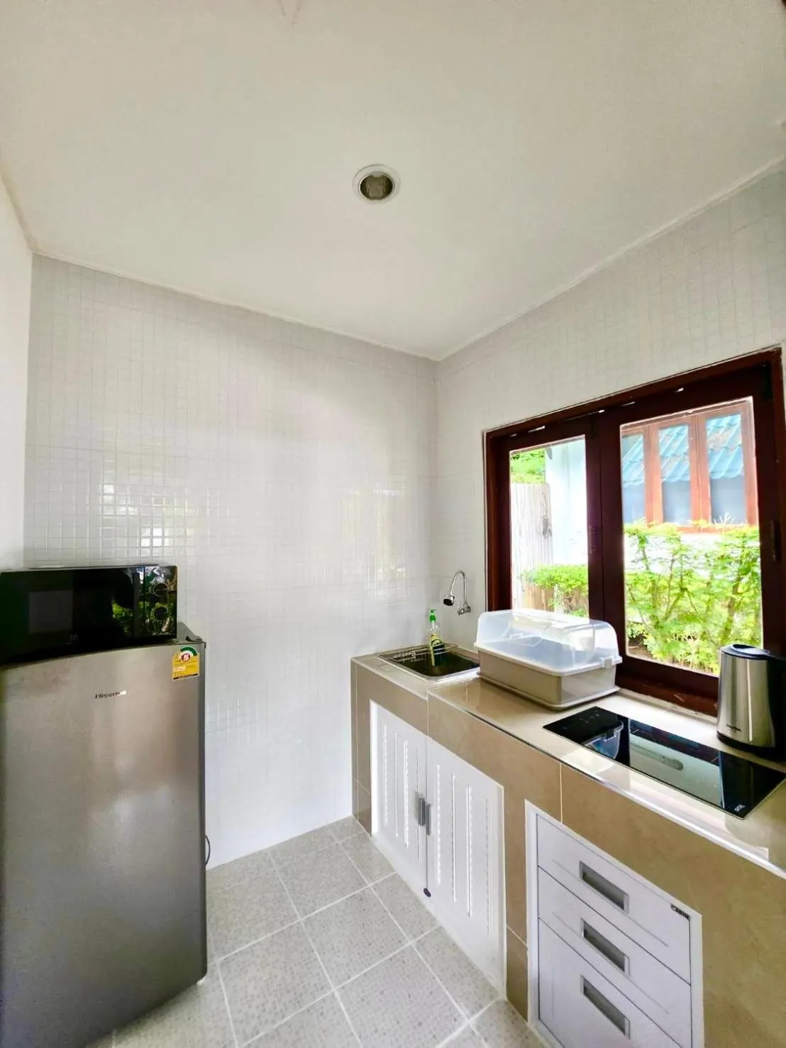 Kitchen or kitchenette in Three Trees Samui Resort - Sarocha Villa
