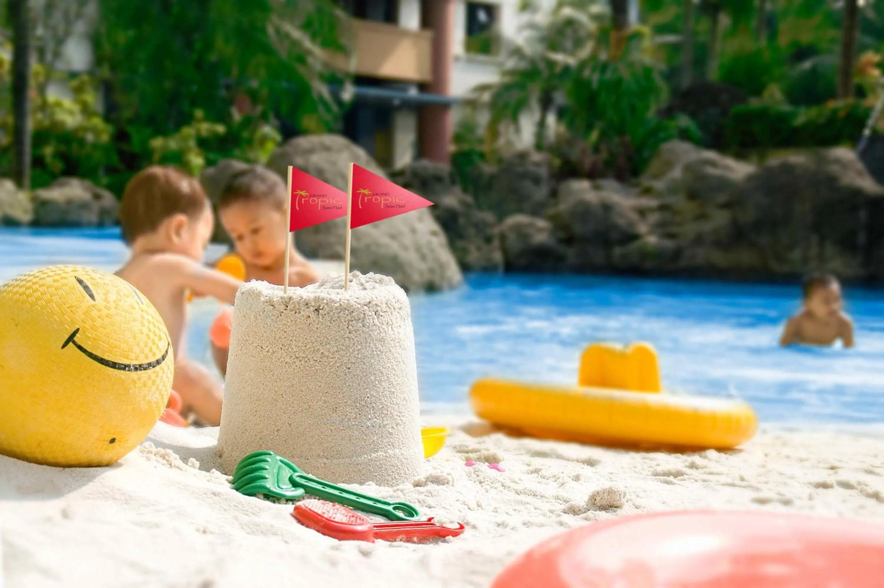 Swimming pool in Grand Tropic Suites Hotel