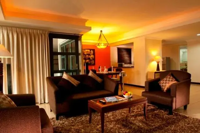 Photo of the whole room, Seating Area in Grand Tropic Suites Hotel