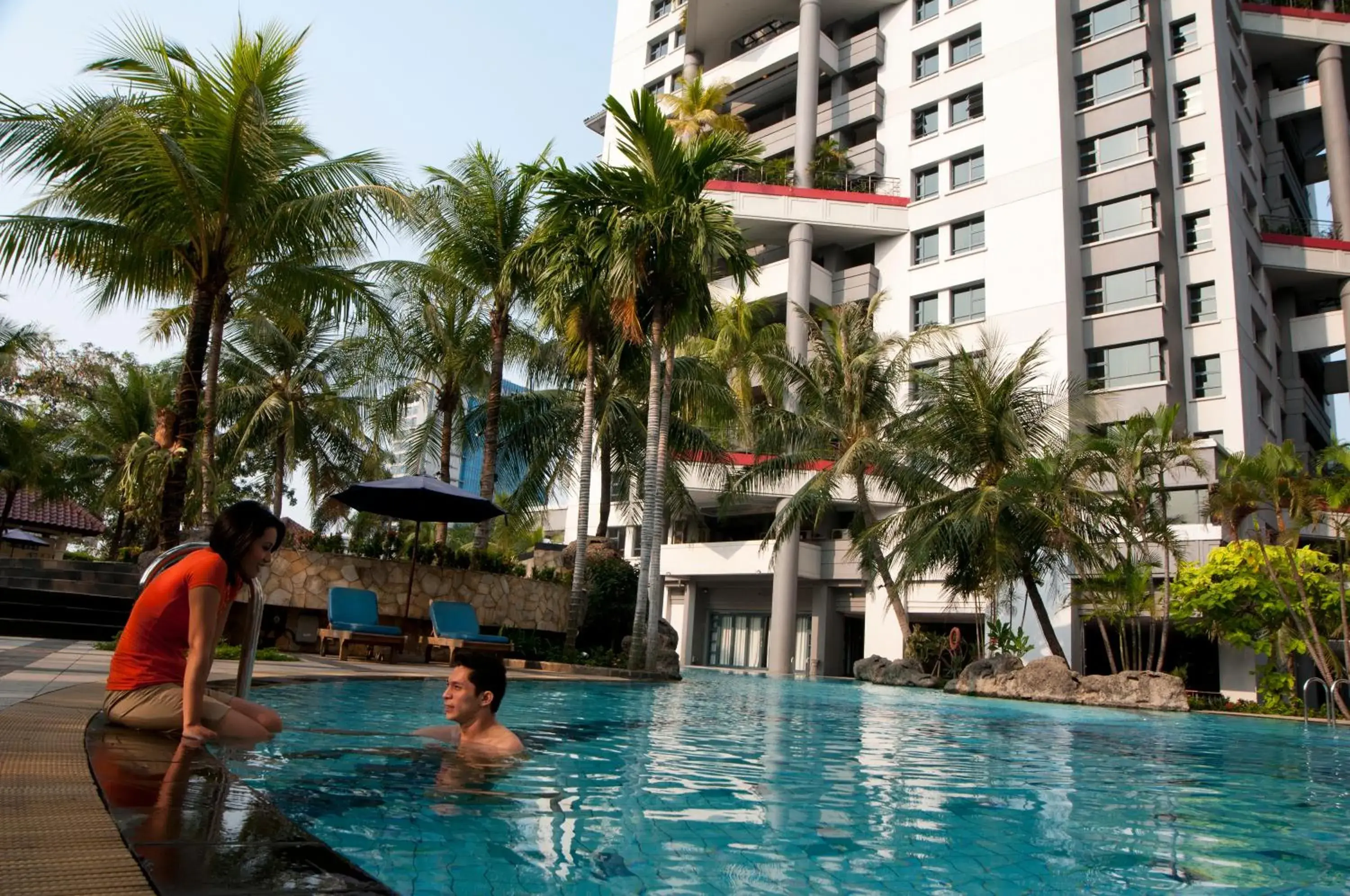 People, Swimming Pool in Grand Tropic Suites Hotel