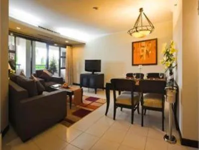 Living room in Grand Tropic Suites Hotel
