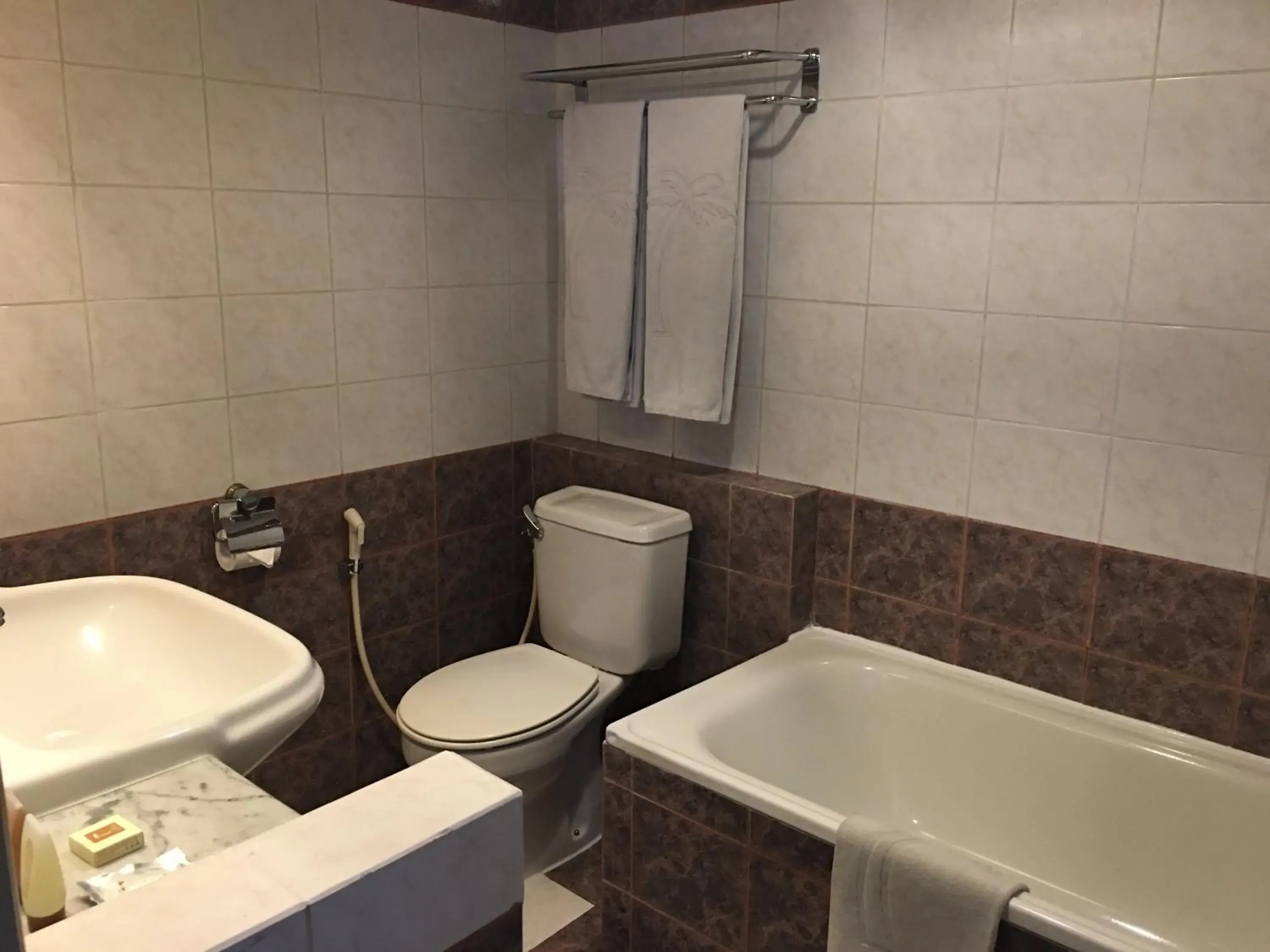 Bathroom in Grand Tropic Suites Hotel