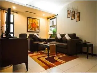 Living room, Seating Area in Grand Tropic Suites Hotel