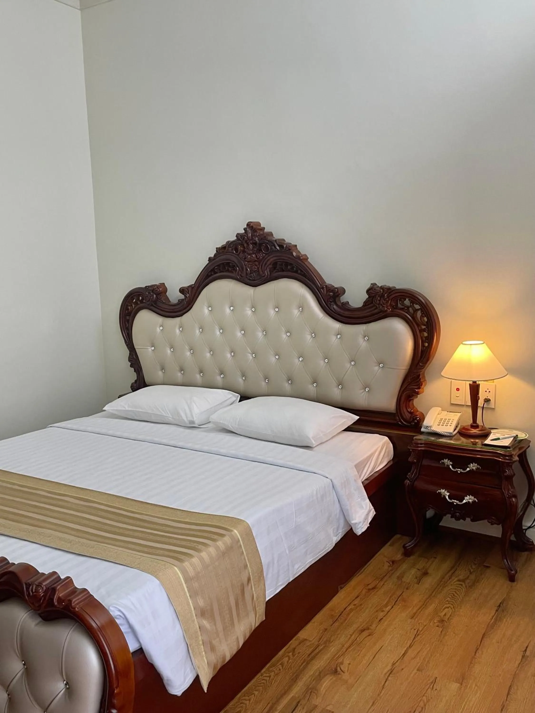 Bed in Victory Sai Gon Hotel