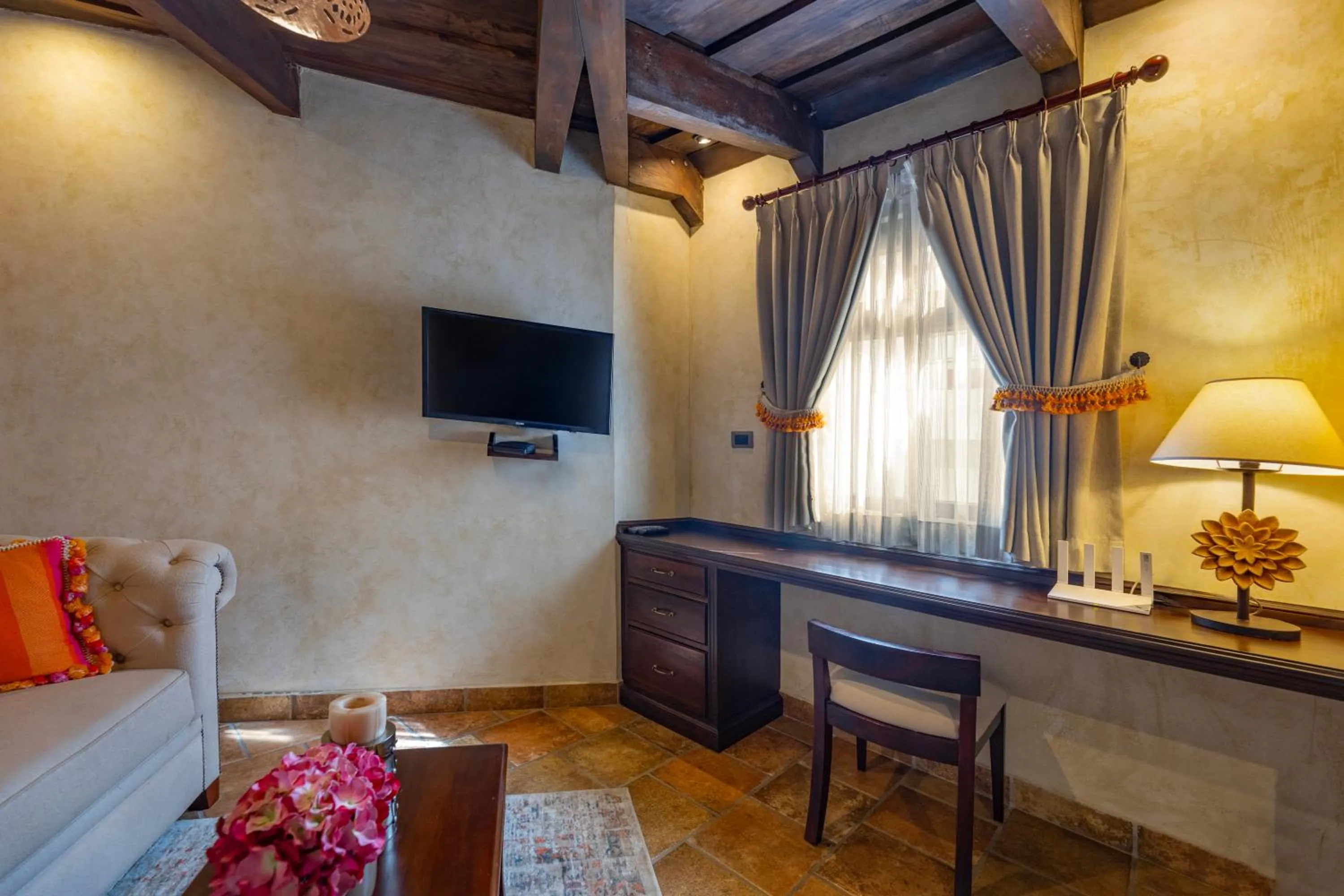 TV and multimedia in Casa Faustina Boutique Hotel