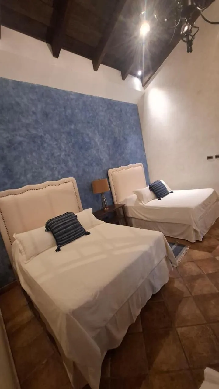 Bed in Casa Faustina Boutique Hotel