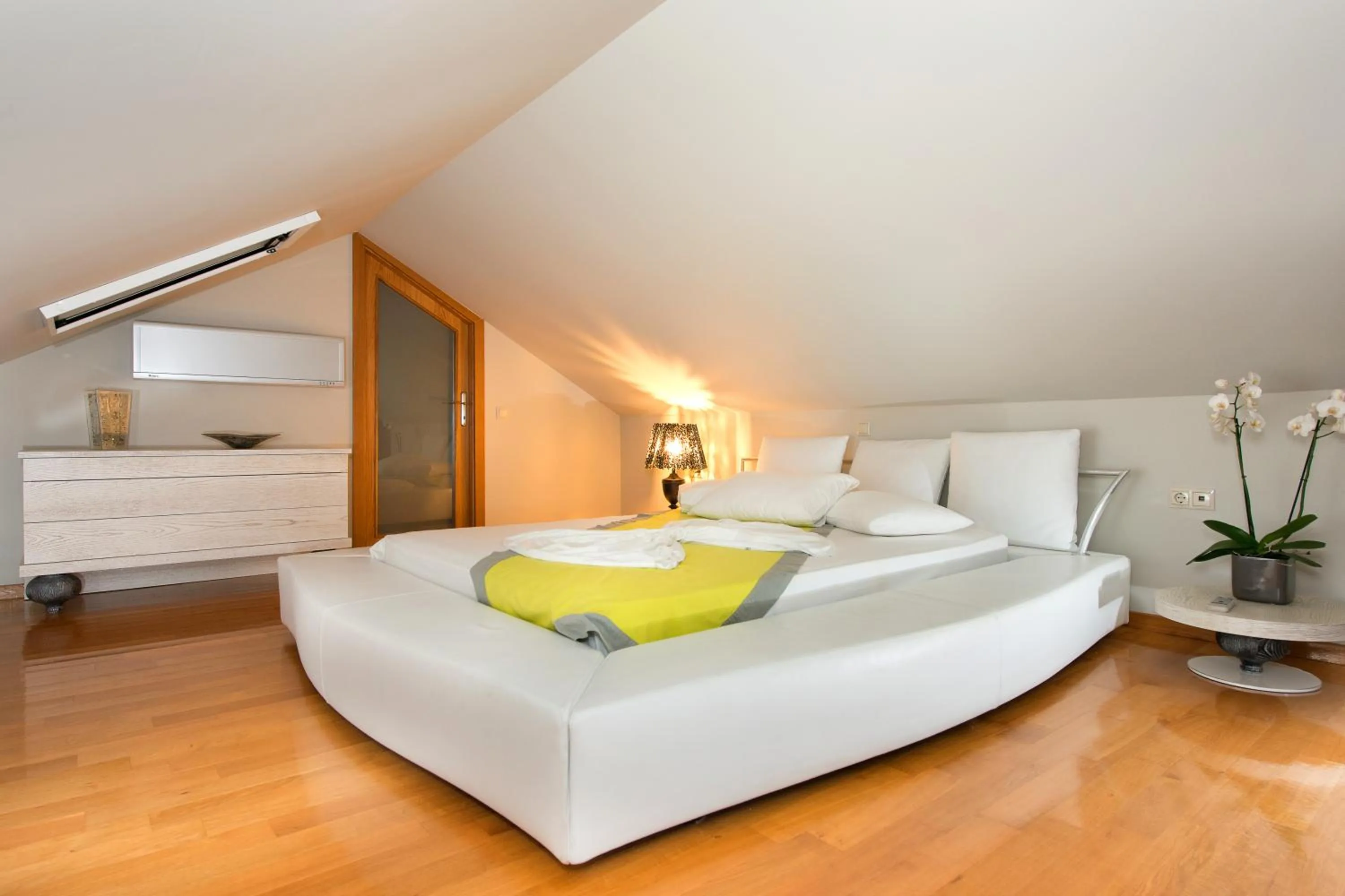 Bed in Louloudis Boutique Hotel