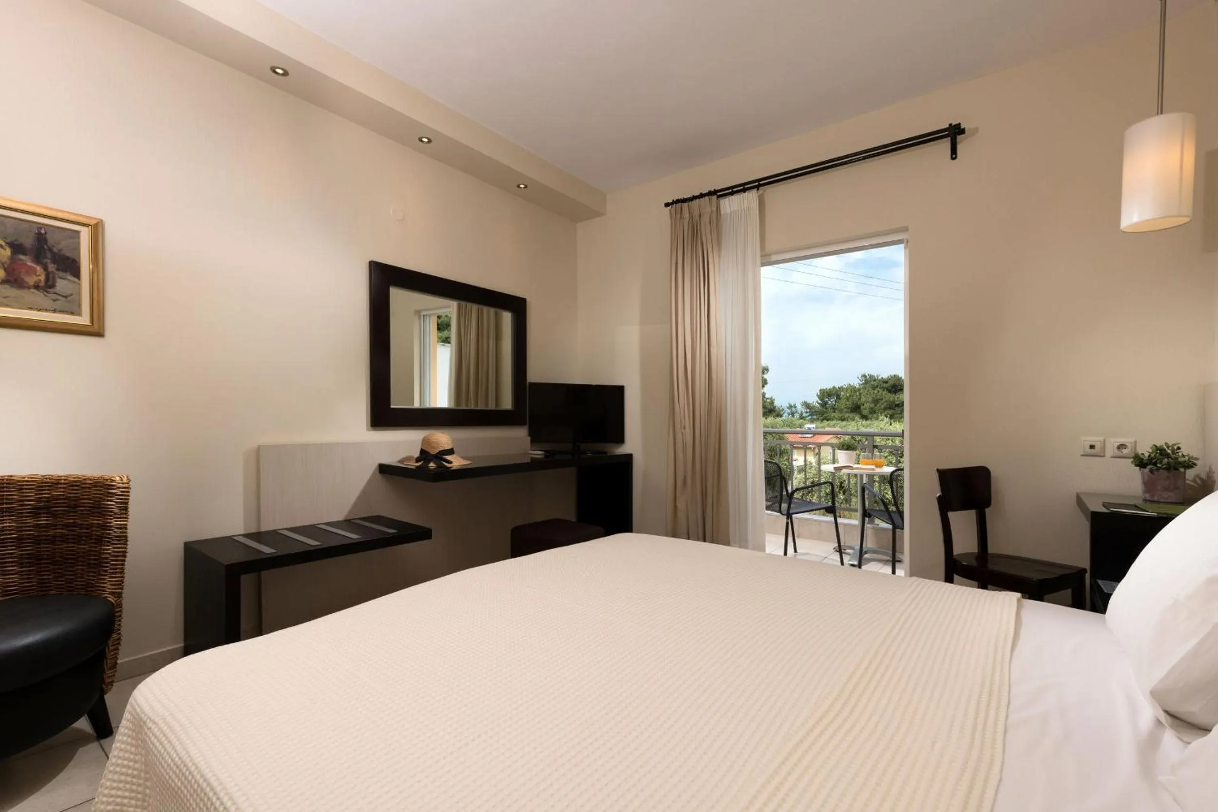 Bed in Louloudis Boutique Hotel