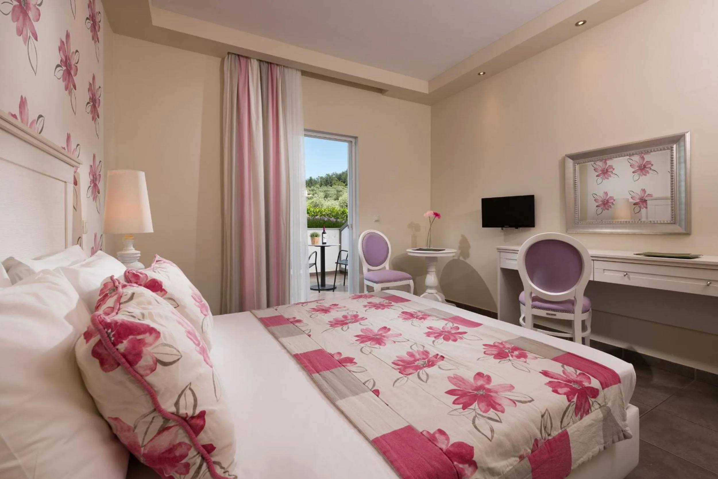 Bed in Louloudis Boutique Hotel