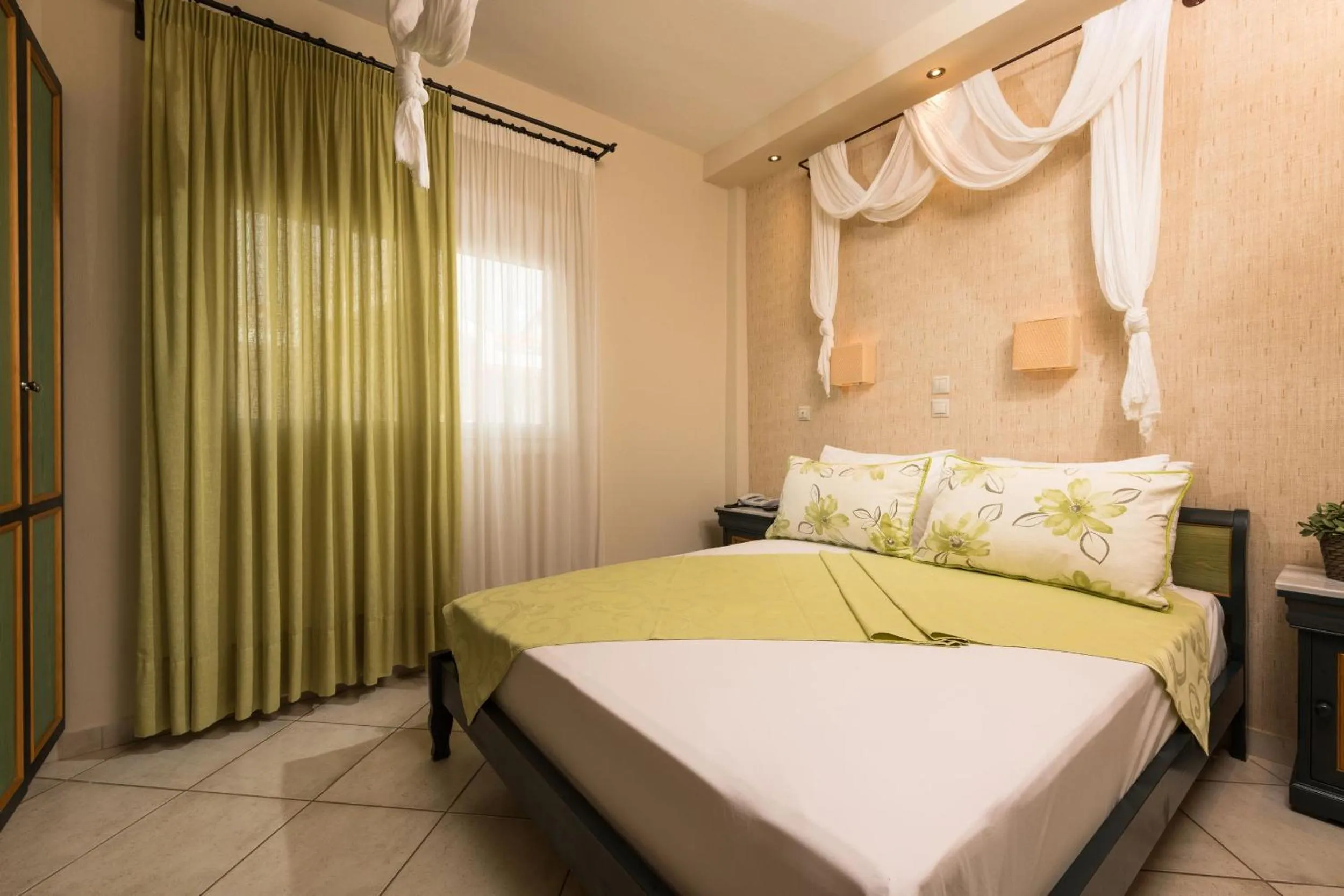 Bed in Louloudis Boutique Hotel