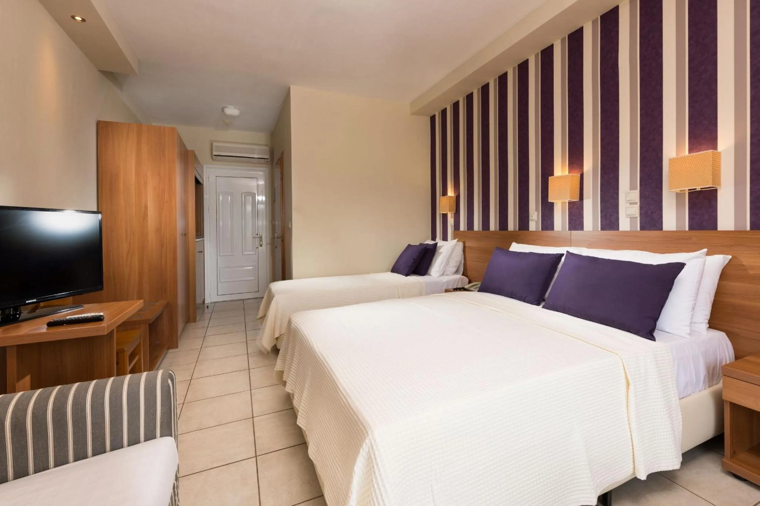 Bed in Louloudis Boutique Hotel