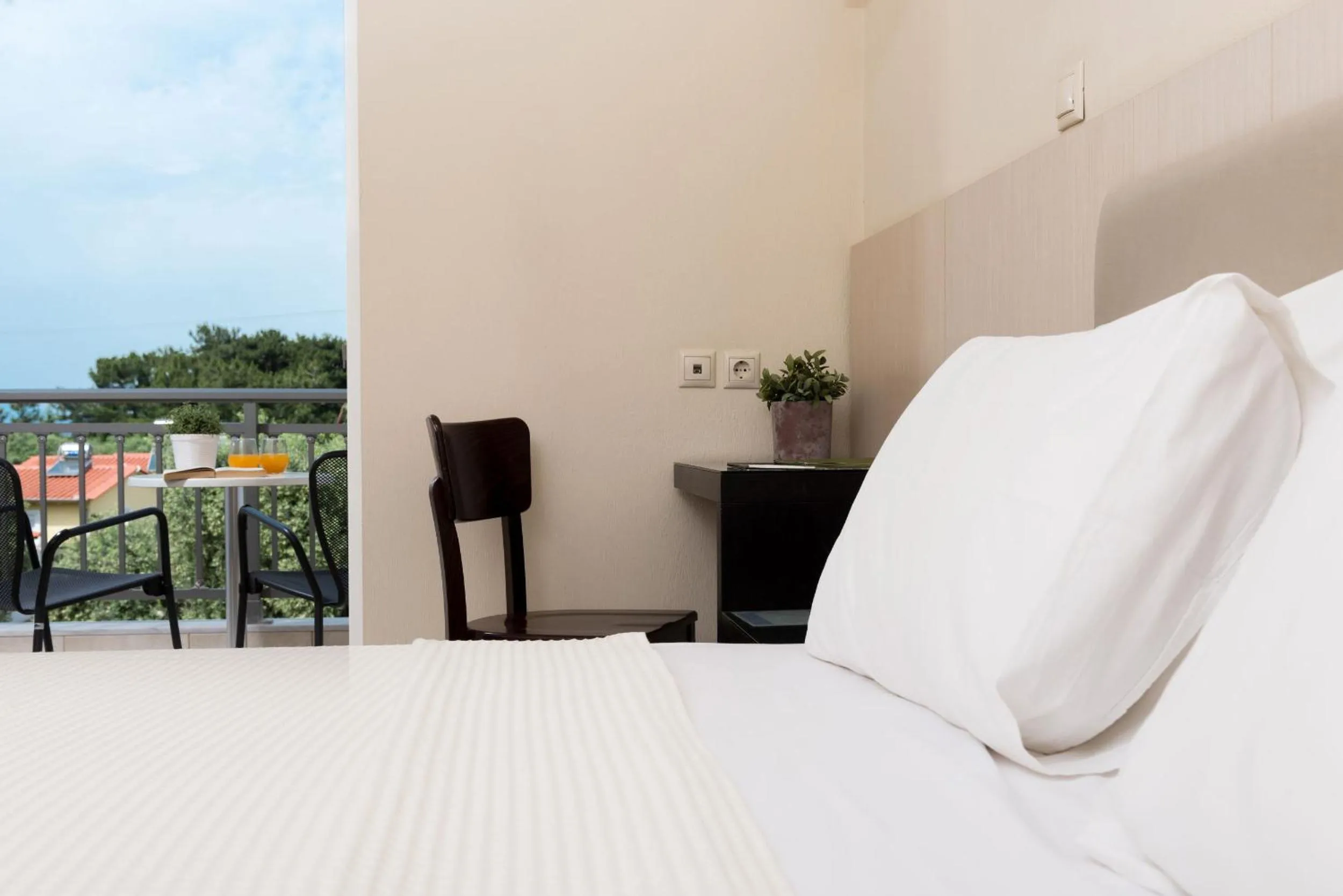 Bed in Louloudis Boutique Hotel