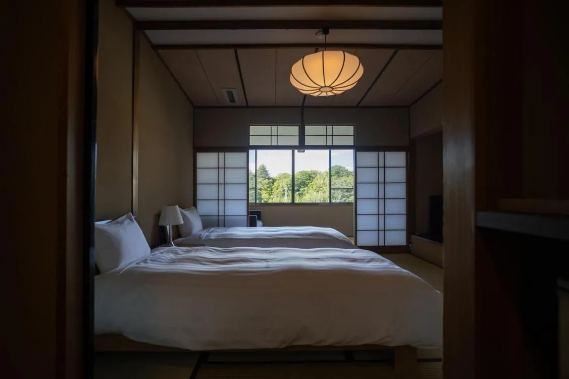 Bed in Arima Onsen Takayamaso Hanano
