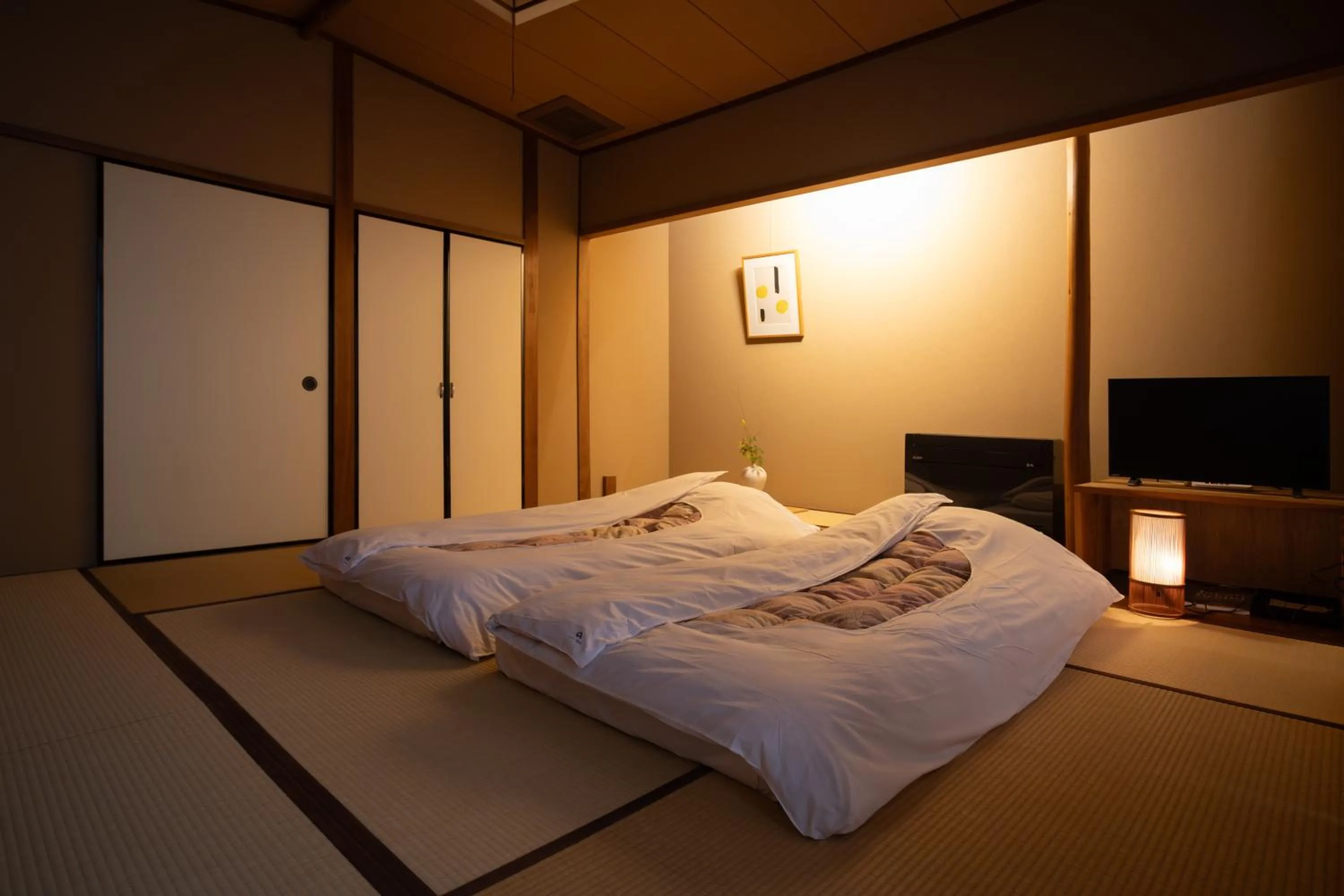 Bed in Arima Onsen Takayamaso Hanano