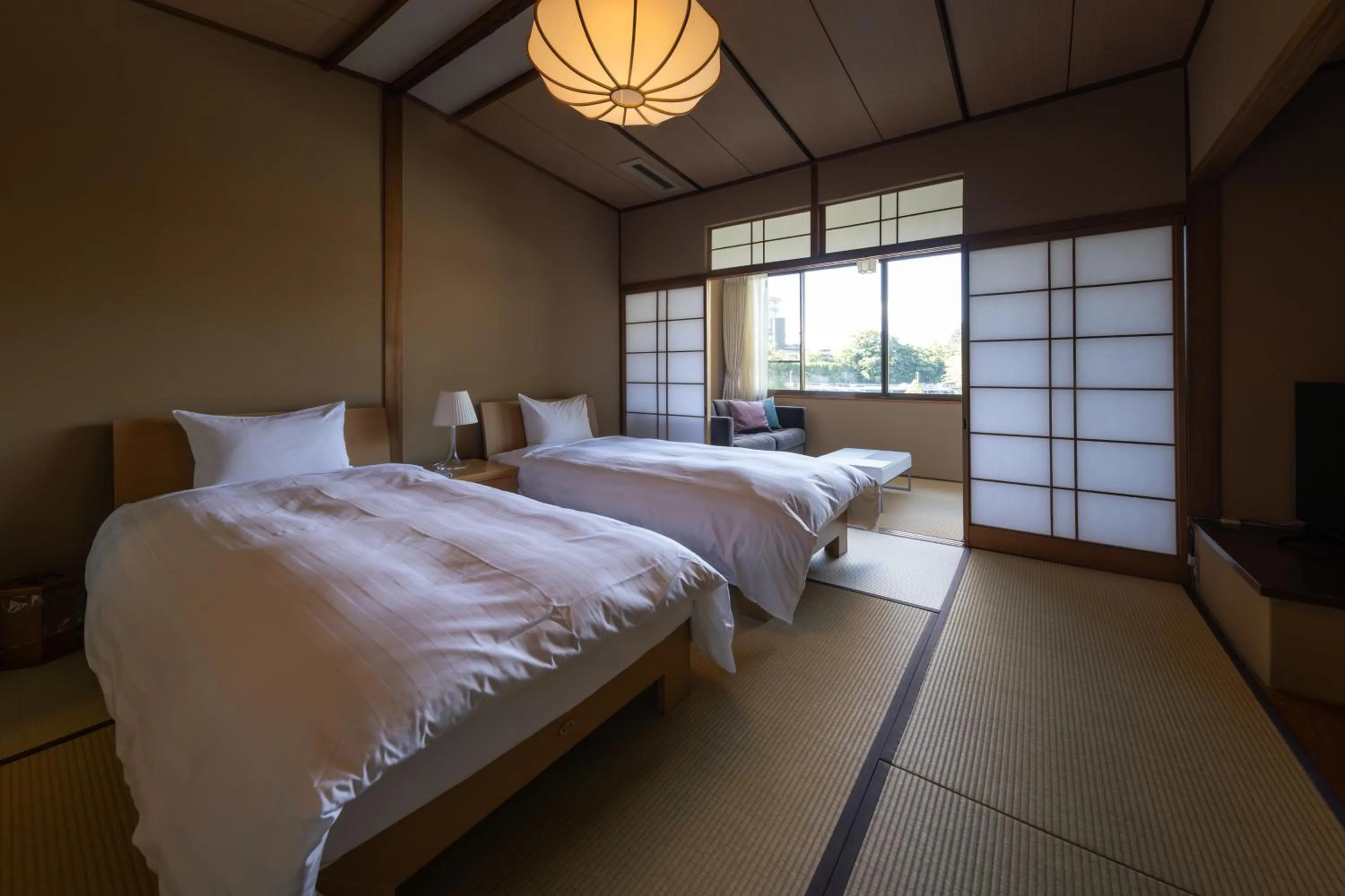 Bed in Arima Onsen Takayamaso Hanano