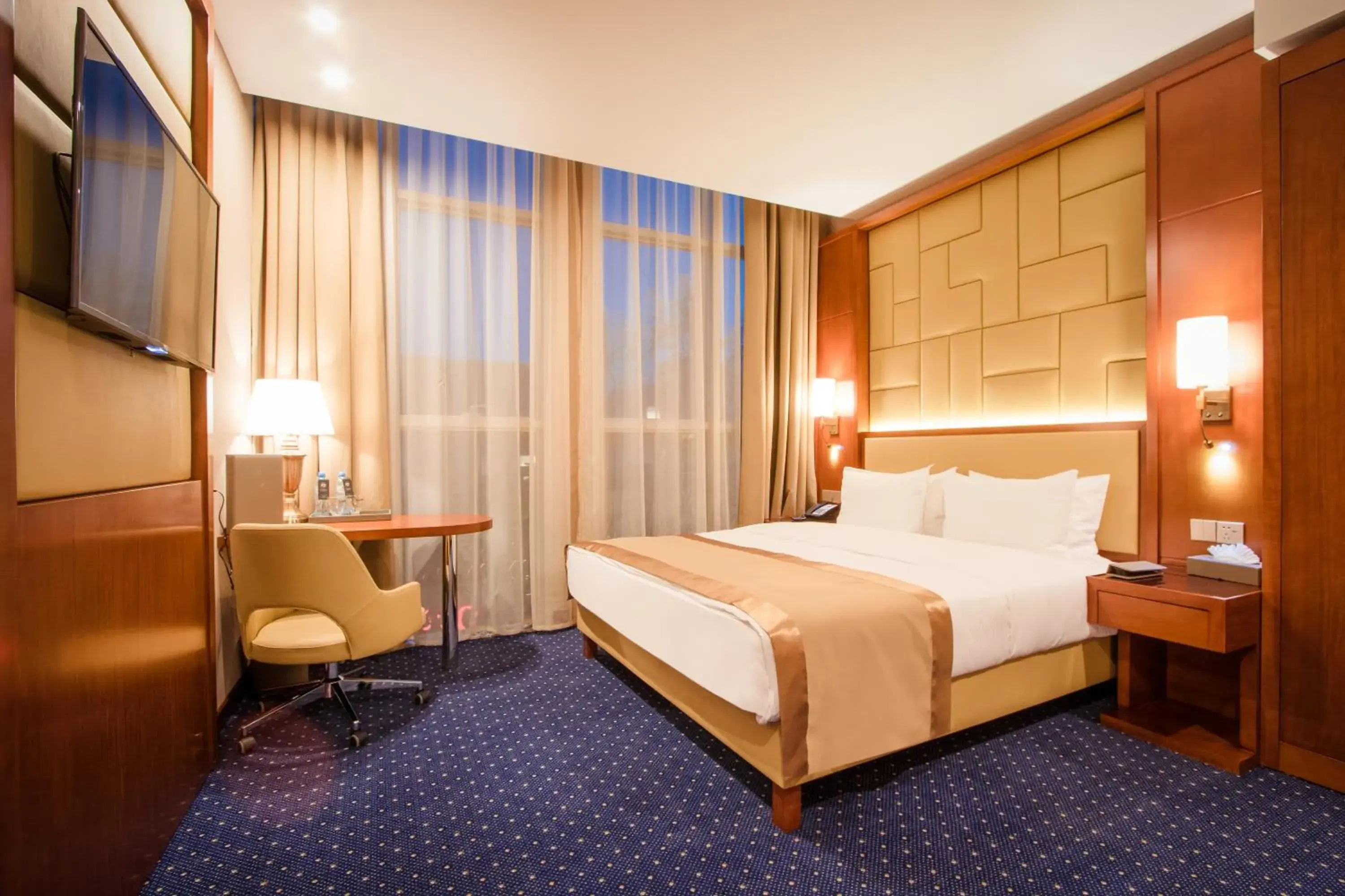 Bed in New Tiflis Hotel Bed in New Tiflis Hotel