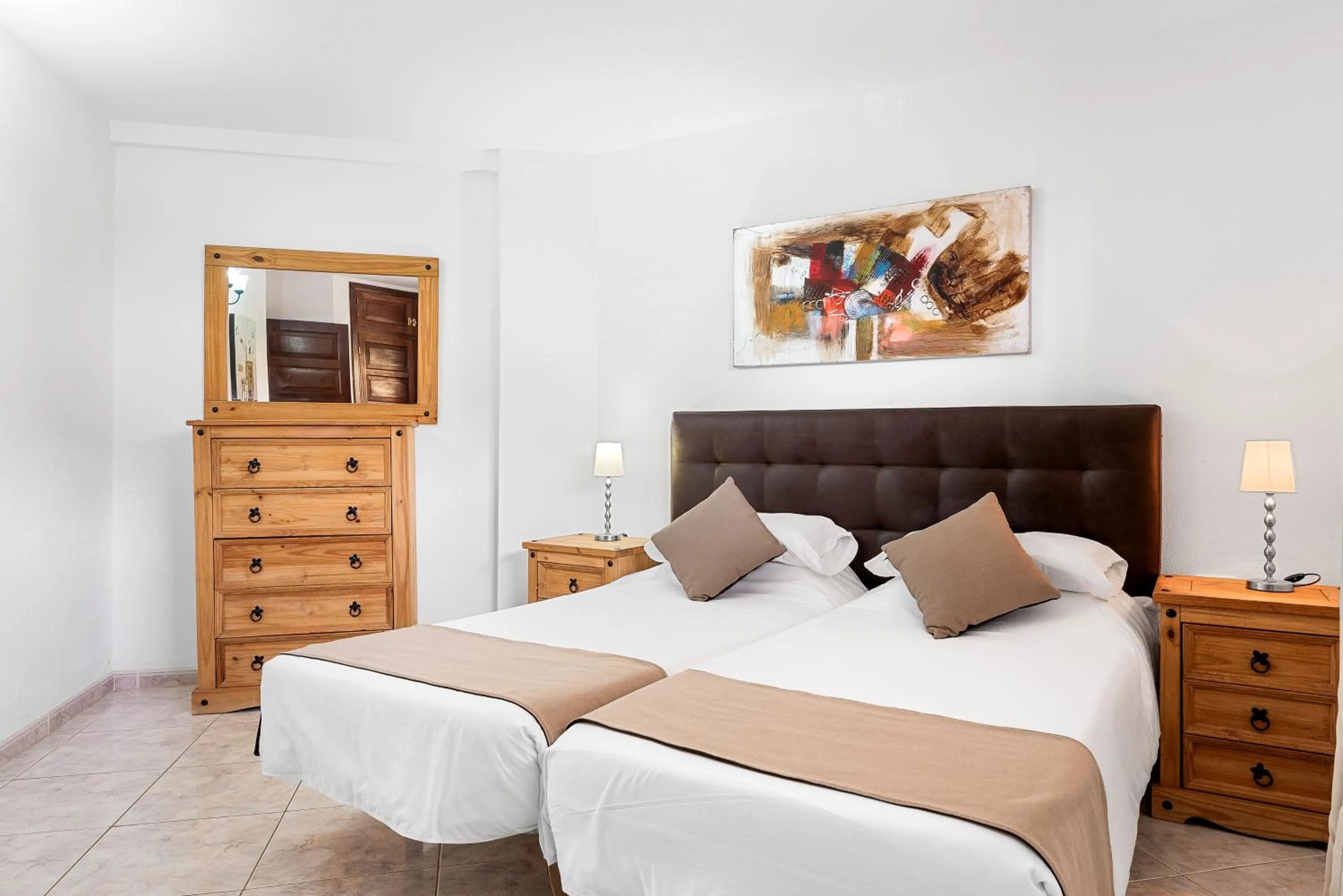 Bed in Paloma Beach Apartments