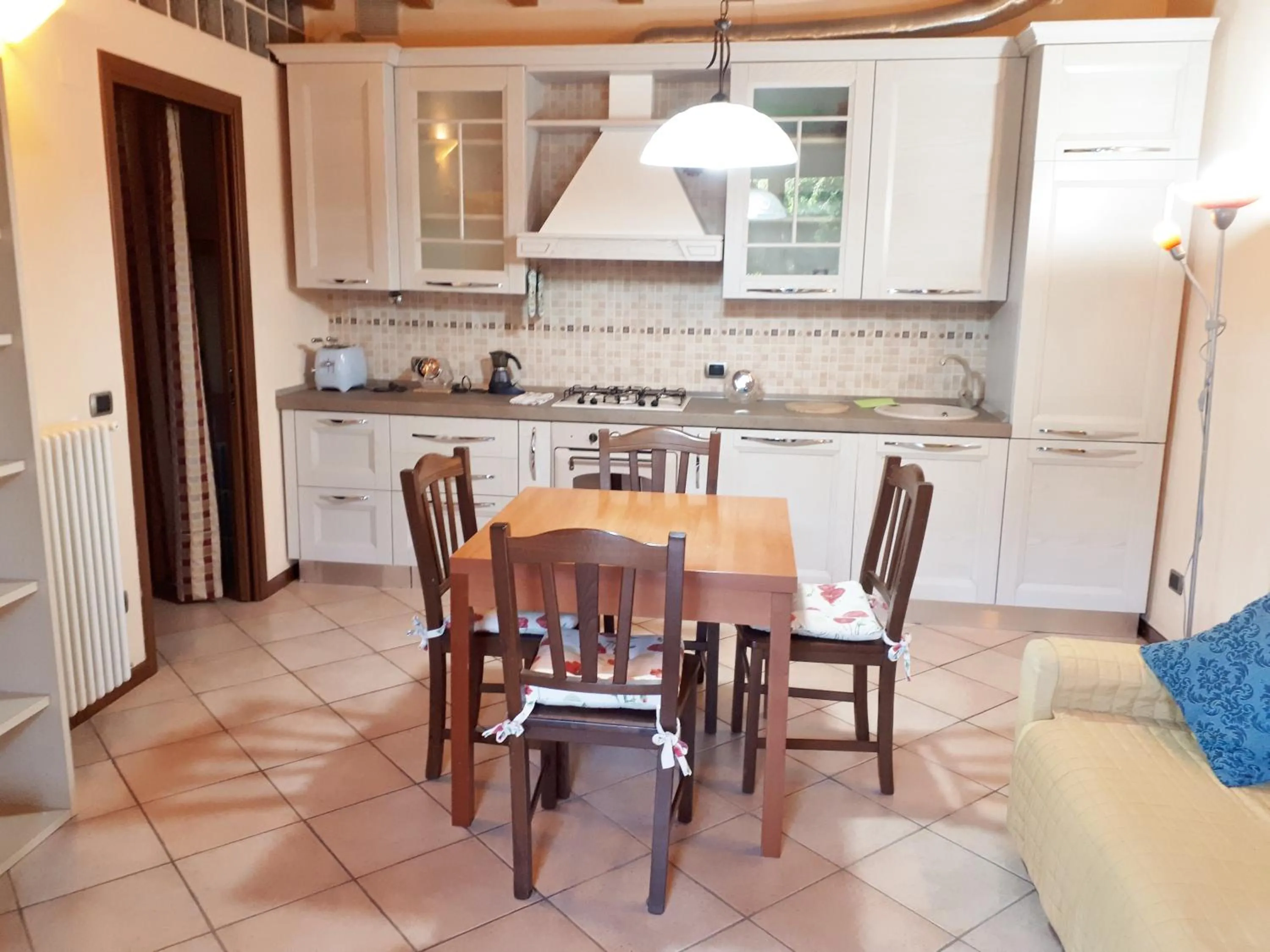 Kitchen or kitchenette in Albergo La Quiete