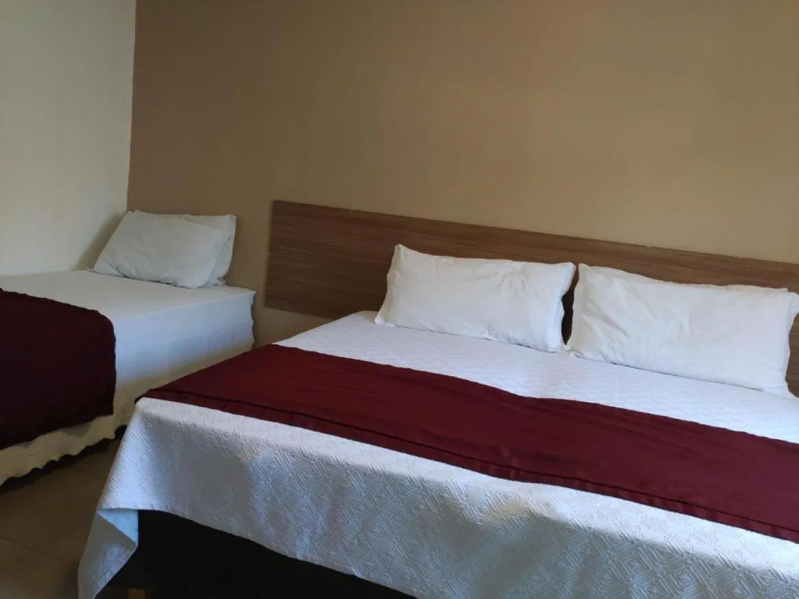 Bed in Itacuruçá Inn