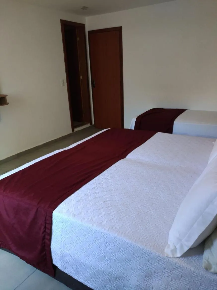 Bed in Itacuruçá Inn