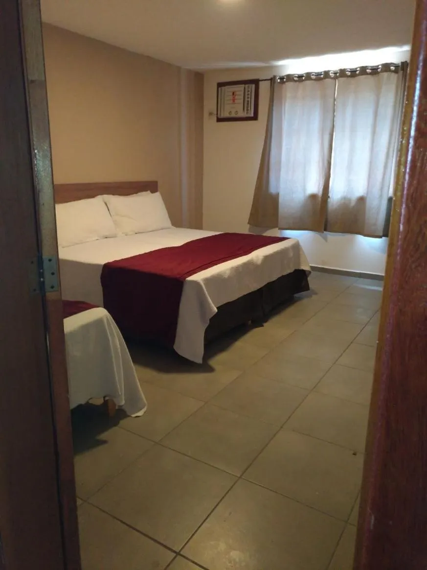 Bed in Itacuruçá Inn